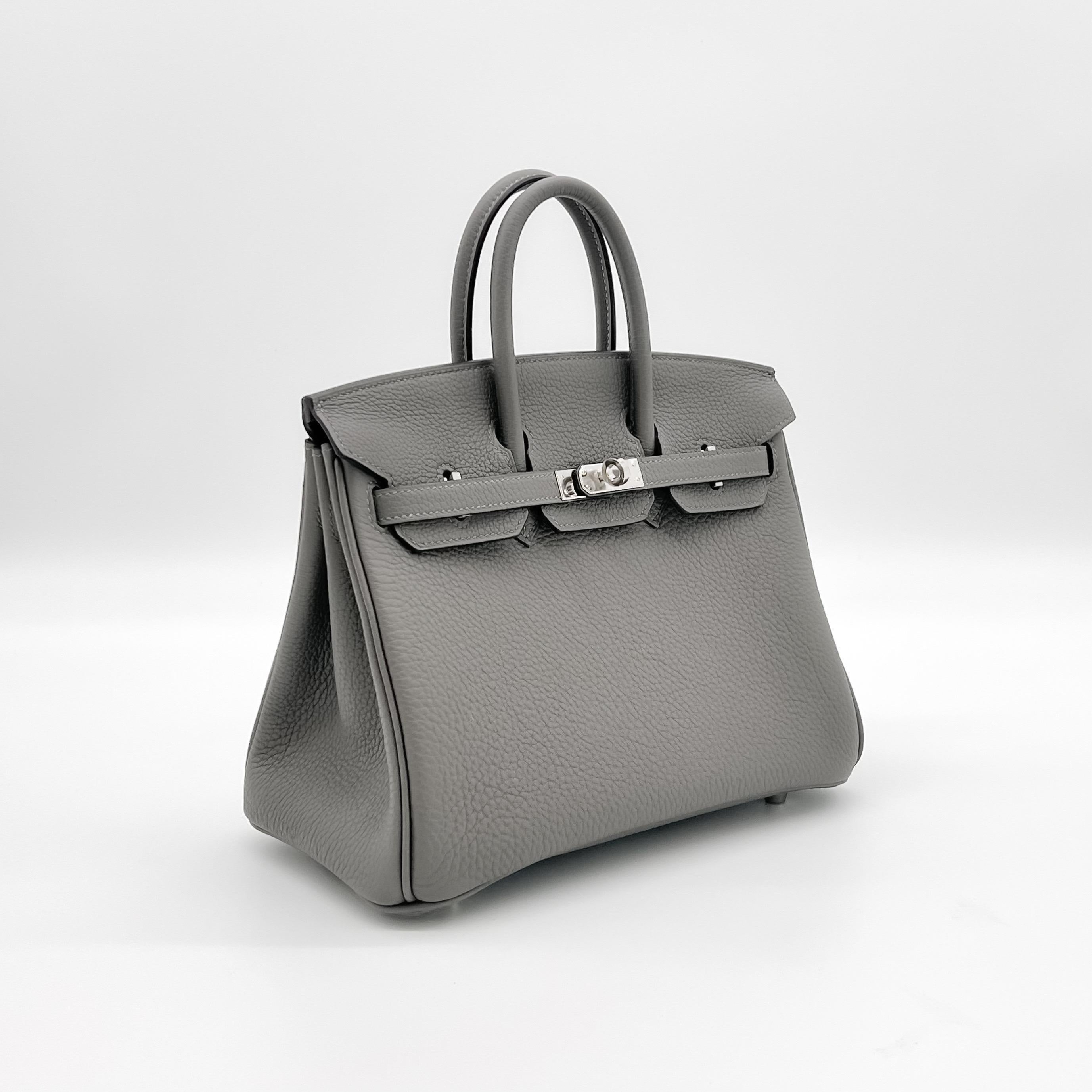 2022 Limited Colour Birkin 25. This beautiful Birkin 25 comes in Gris Meyer a light grey colour. It is in Togo leather and has Palladium Hardware.

This bag is unused, brand new condition with hardware protection seals still attached. 

This item