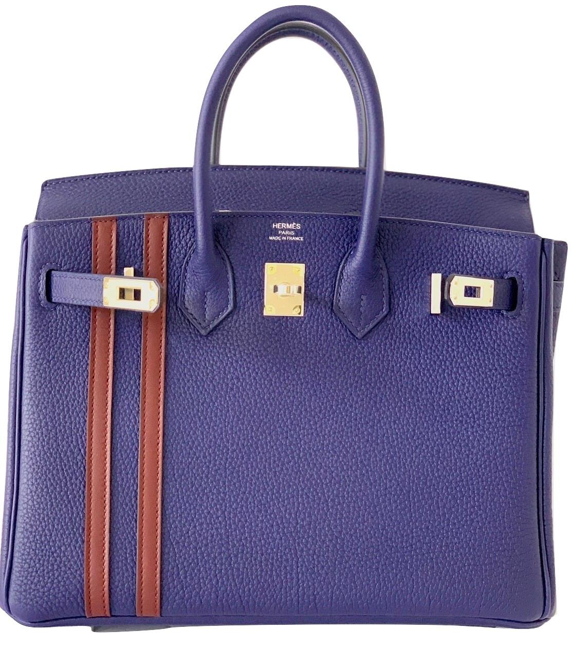 Hermes Limited Edition Birkin

25cm

The Officier

Blue Encre with Bordeaux

Togo Leather

Swift Stripe

Palladium Hardware

Collection: C
Measurements
Base Length: 9.75 in
Height: 7.75 in
Width: 5 in
Drop: 2.25 in

Hermes Box, Tissue, Lock and 2