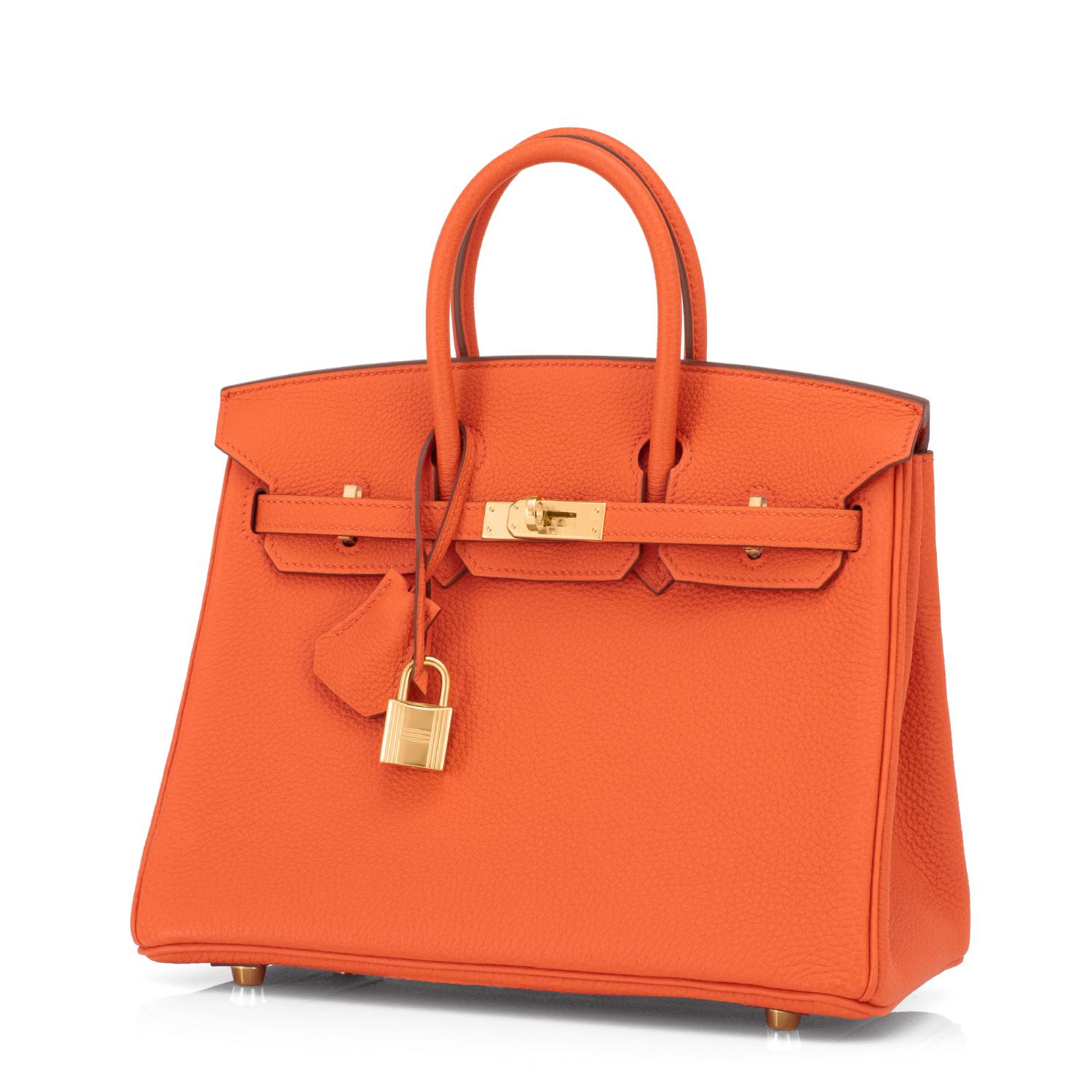 Hermes Birkin 25 Orange Feu Bag Gold Jewel Y Stamp, 2020
Just purchased from Hermes store; bag bears new interior 2020 Y Stamp.
Brand New in Box. Store fresh. Pristine Condition (with plastic on hardware)
Perfect gift! Comes with keys, lock,