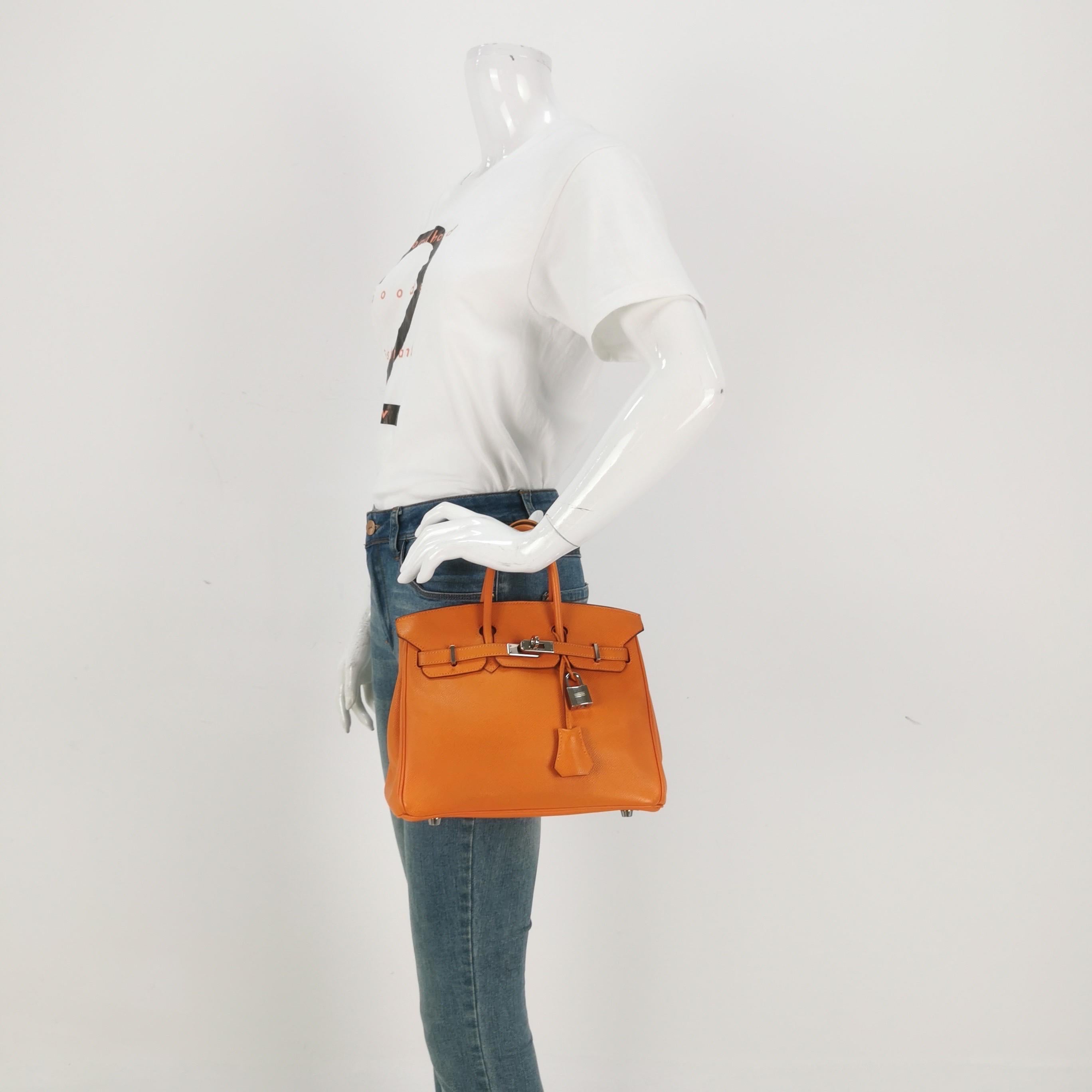 Condition: GOOD CONDITION

Moderate signs of use. Light scratches to the hardware and leather. The color was professionally touched up. 

DETAILS

Brand: Hermes
Birkin 25
Exterior Color: 93 Orange H 
Epsom Calfskin leather
Hardware: Silver