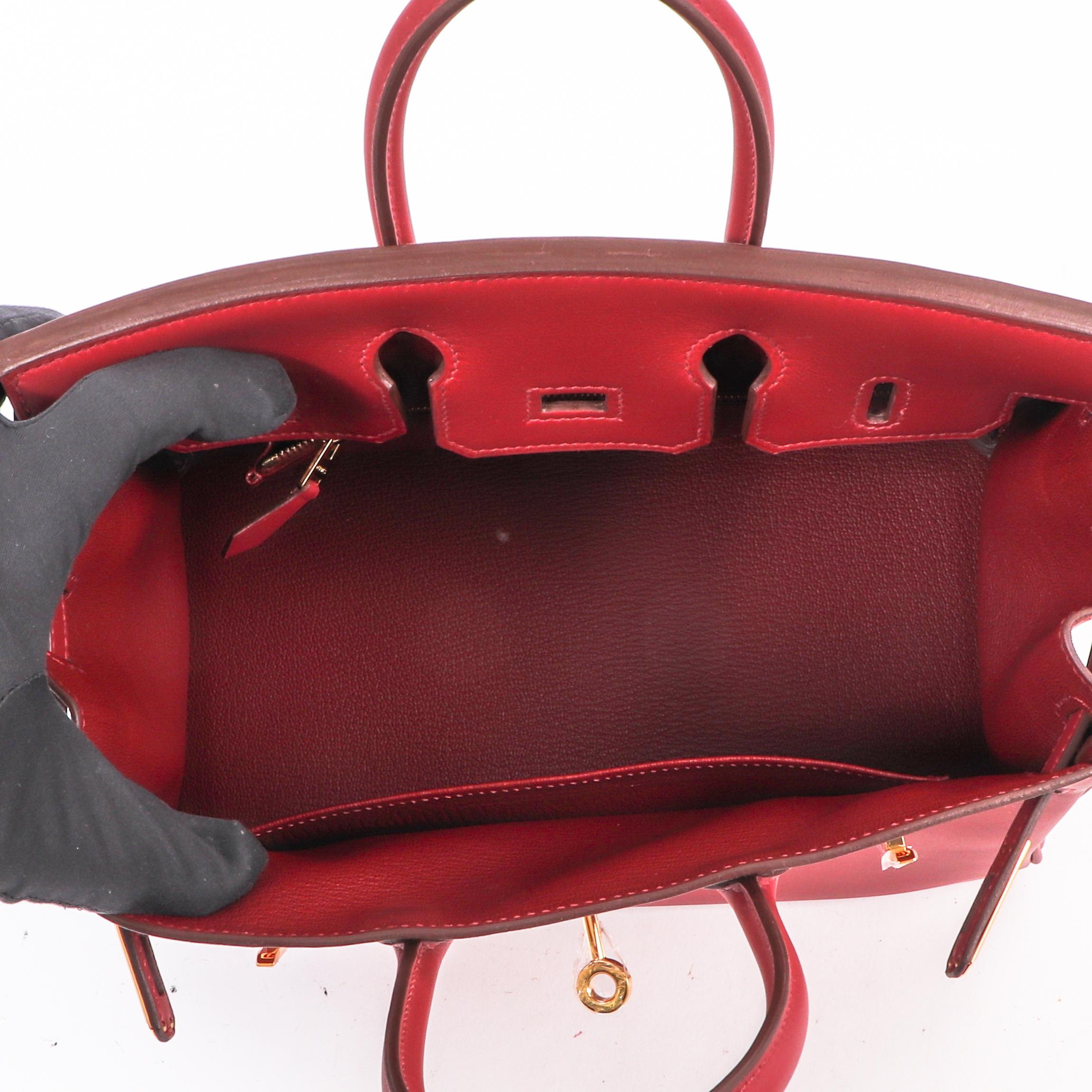 Hermès Birkin 25 Rouge Vif Veau Jonathan Gold Hardware

This stunning Hermès Birkin 25 handbag is crafted of buttery soft Veau Jonathan leather in Rouge Vif red. The Veau Jonathan leather resembles the Swift leather, it is a fine-grained calf