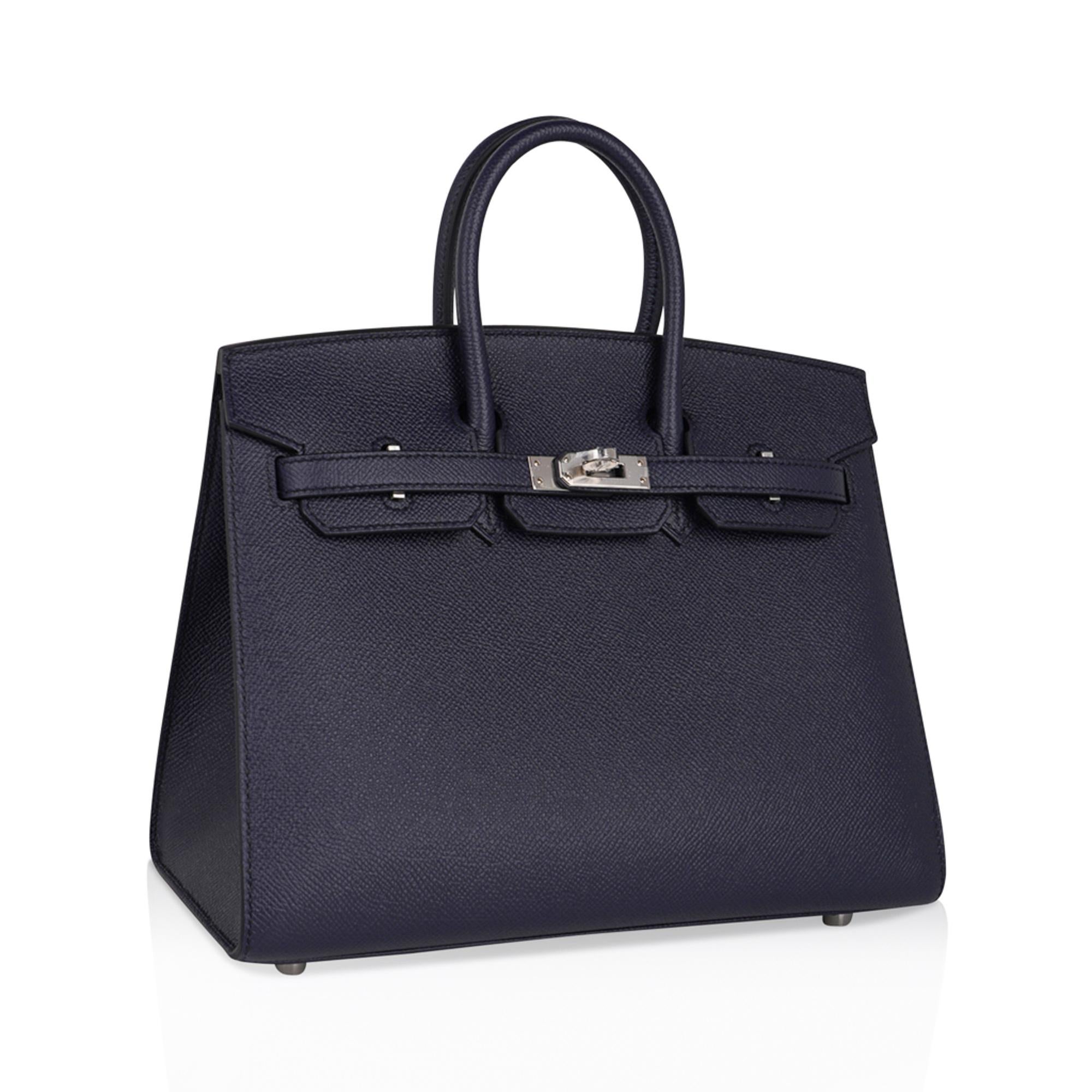 Mightychic offers an Hermes Birkin Sellier 25 bag featured in chic Blue Indigo.
Richly saturated and jewel toned, Hermes Bleu Indigo is gorgeous for year round wear, and completely neutral.
Crips and fresh with Palladium hardware.
This exquisite