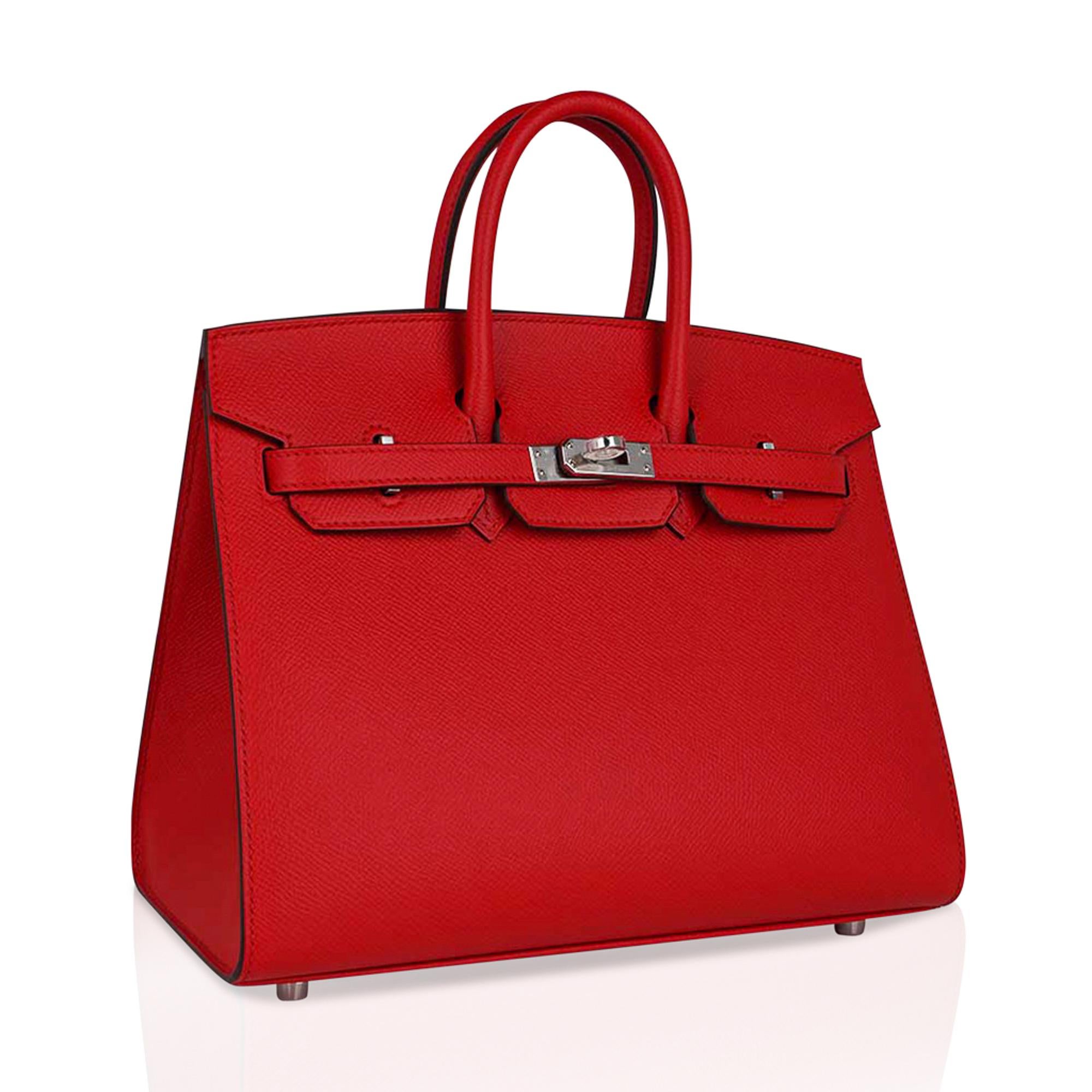 Mightychic offers an Hermes Birkin Sellier 25 bag featured in vibrant Rouge De Couer.
This striking Hermes red is richly saturated and gorgeous for year round wear.
Fresh with Palladium hardware.
This exquisite bag is modern and minimalist.
A sleek