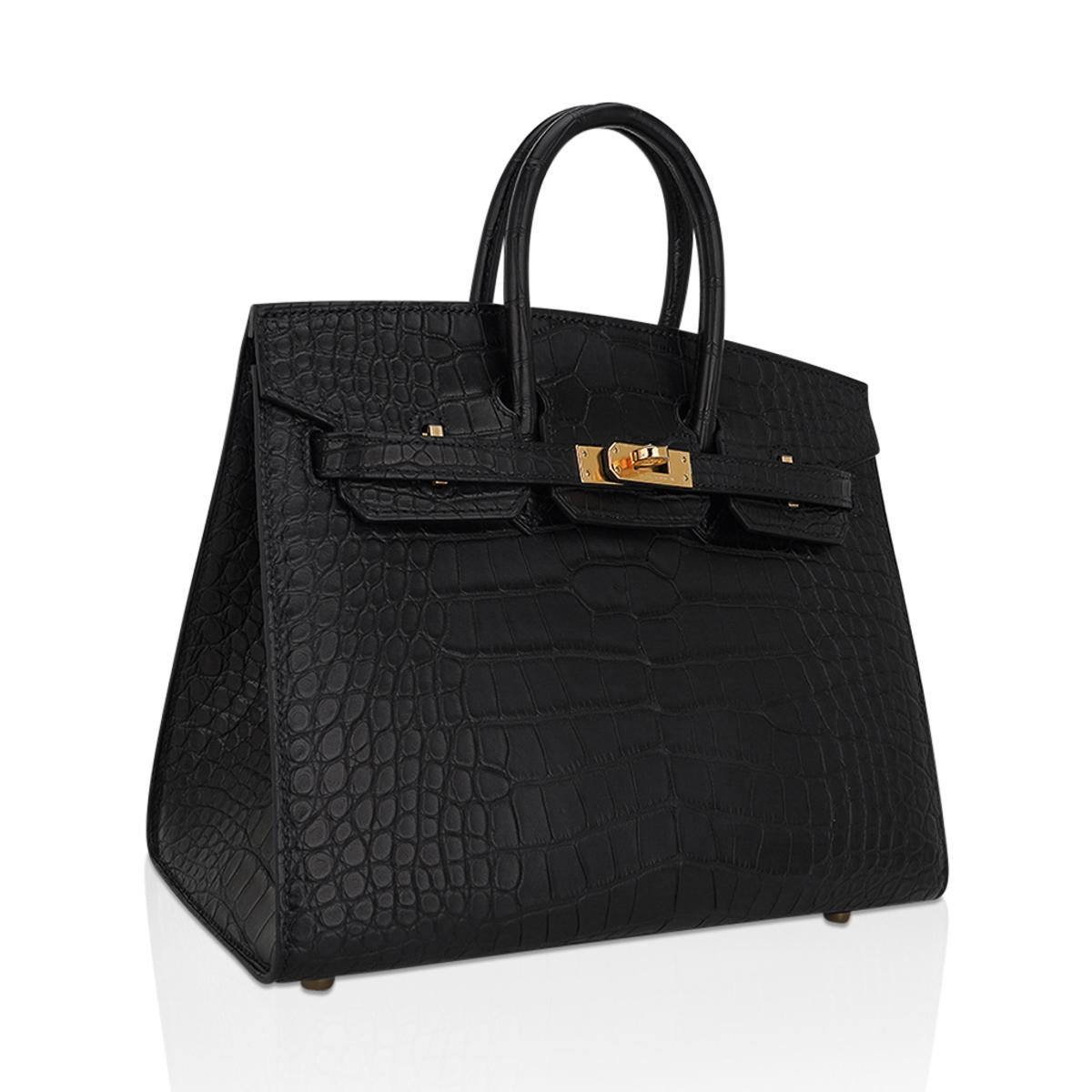Mightychic offers an Hermes Birkin Sellier 25 bag featured in Black matte alligator.
Timeless with rich gold hardware.
The Sellier Birkin is an exquisite modern and minimalist Hermes bag. 
A sleek pared down version that exudes chic