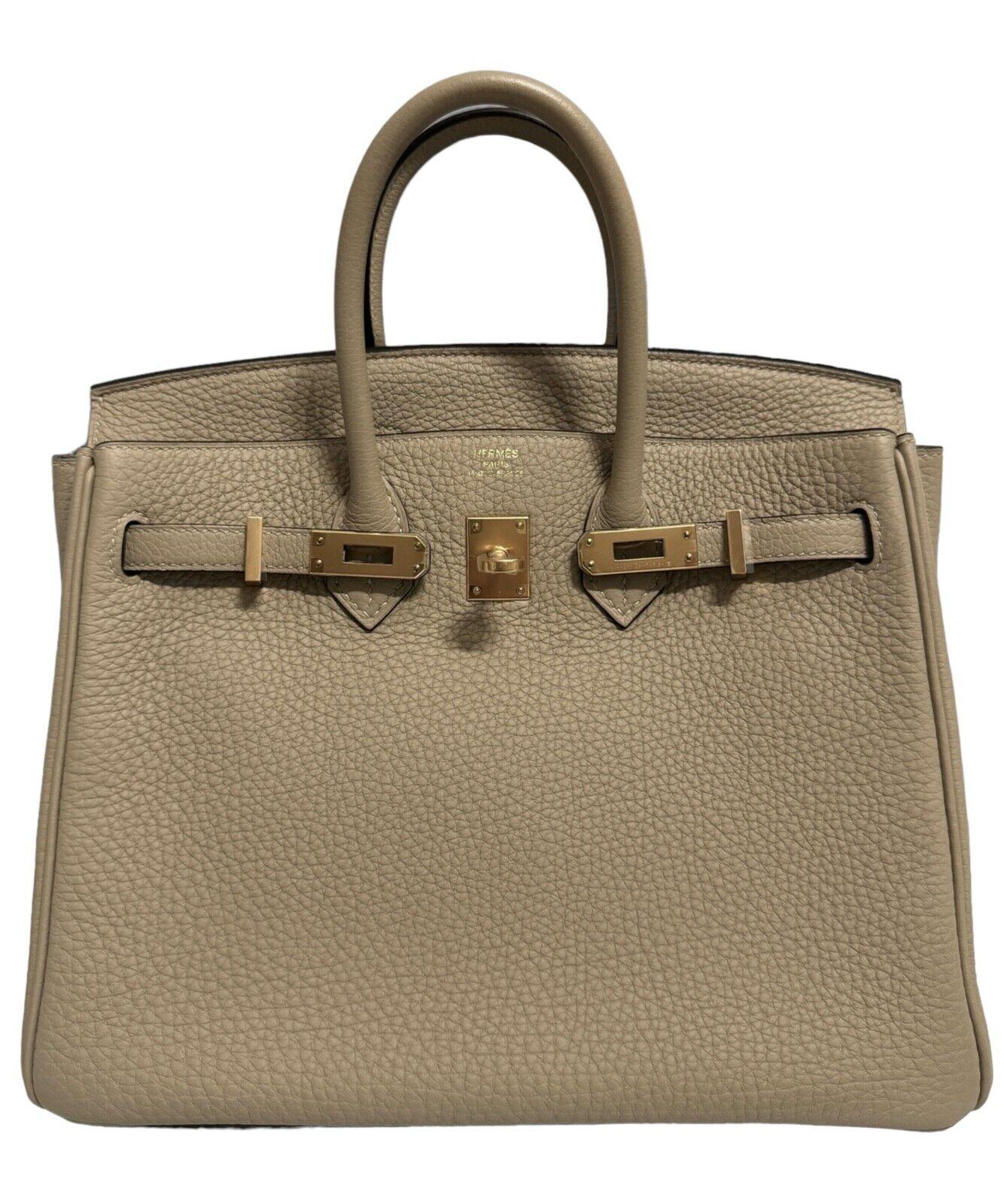 Absolutely Stunning and One The Most Coveted and Difficult to get Hermes Combos! RARE Pristine Like New Hermes Birkin 25 TrenchTogo Leather complimented by Gold Hardware. Plastic on all Hardware. Worn only 1 time and stored away. Minor hairlines on
