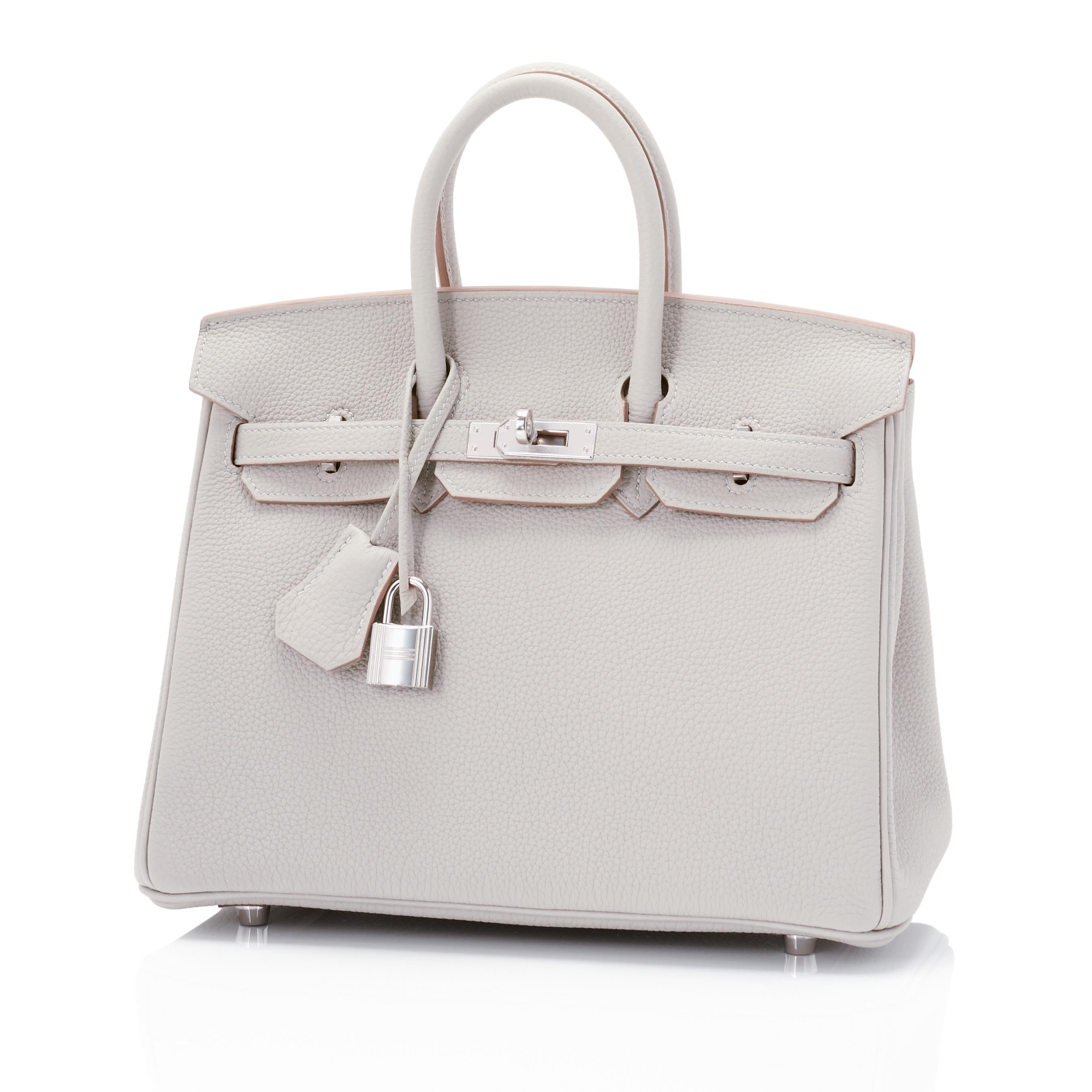 Hermes Birkin 25cm Gris Perle Togo Bag Palladium Hardware
Brand New in Box. Store Fresh. Pristine Condition (with plastic on hardware) 
Perfect gift! Comes full set with keys, lock, clochette, a sleeper for the bag, rain protector, and Hermes