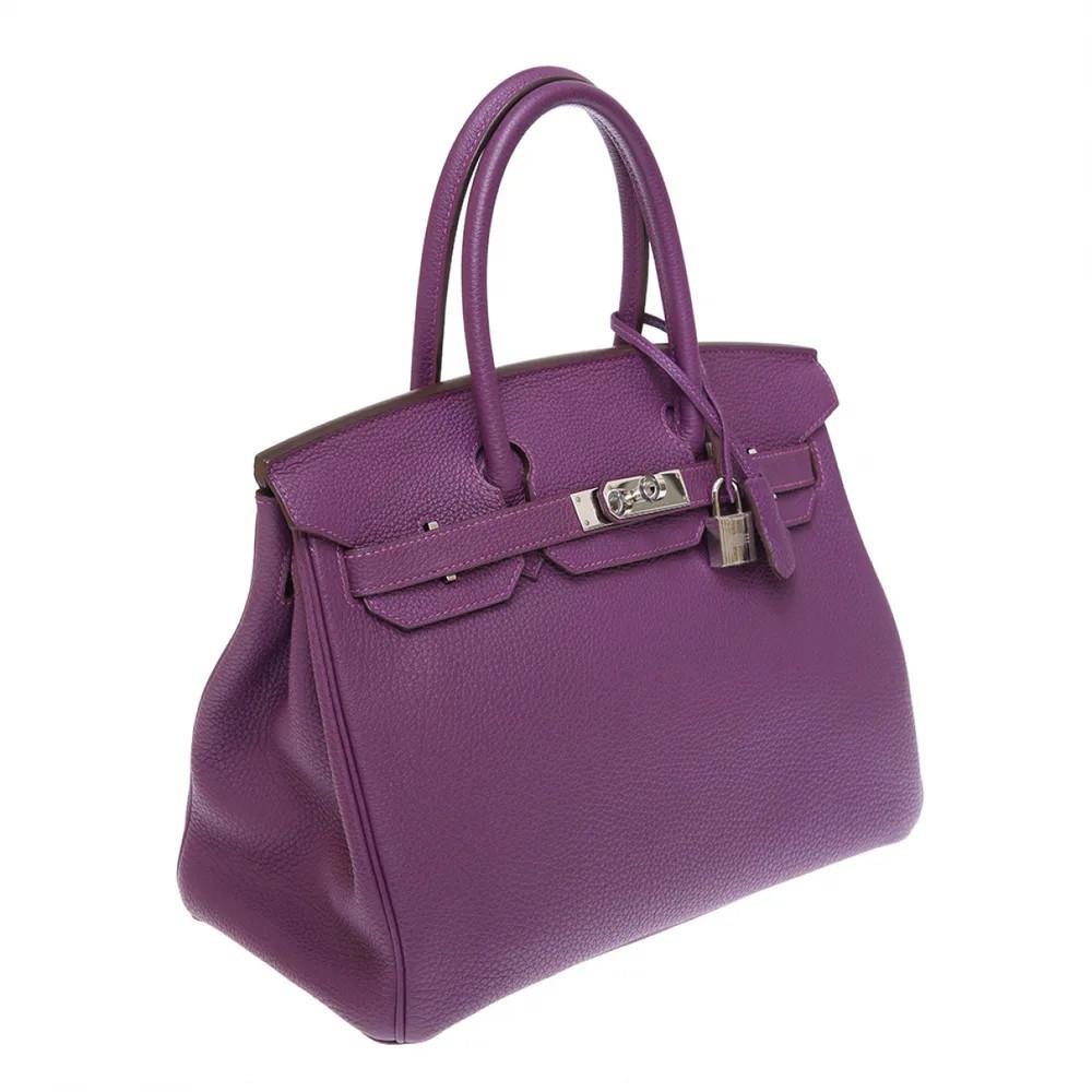 Hermès Birkin 30 Anemone 
2014 Hermès Birking 30 bag in purple, anemone leather tone with silver tone hardware.
Slight scratches not visible on the metal parts. 
 Leather is in very good condition. Supplied with padlock, keys, bell 
Measures
Width: