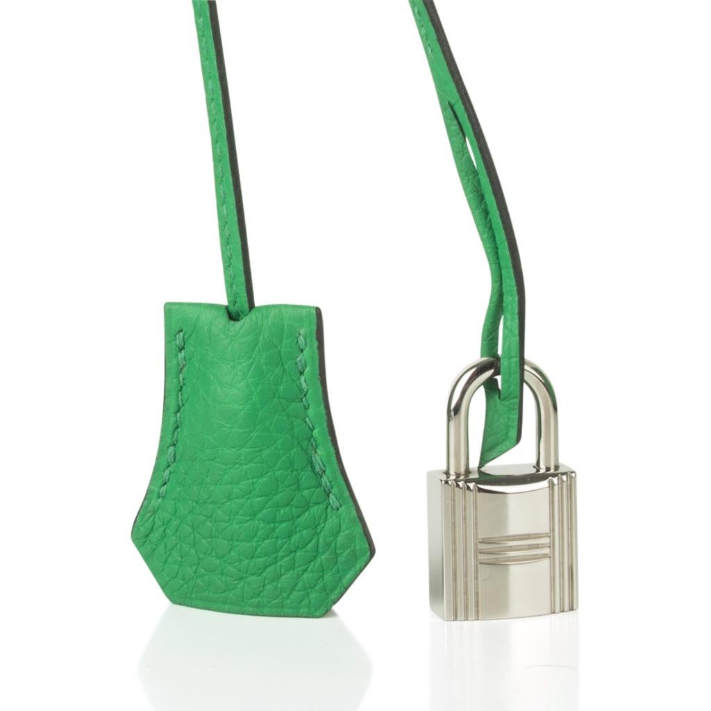 Guaranteed authentic Hermes Birkin 30 bag features vivid Bamboo green.
With palladium hardware this beauty is a standout for summer!
Togo leather is textured and scratch resistant. 
Comes with lock, keys, clochette, raincoat and sleeper.
Light wear