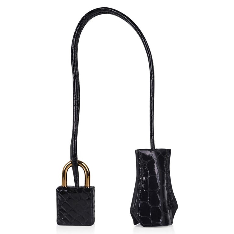 Mightychic offers an Hermes Birkin 30 bag featured in classic, rich Black Porosus Crocodile.
Beautiful scales accentuated with brushed gold hardware.
This exotic Hermes Birkin beauty moves easily from day to evening.
NEW or NEVER WORN
Comes with the