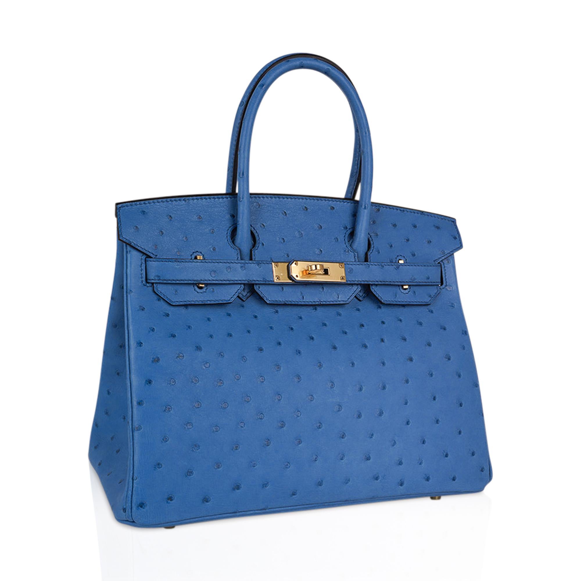 Mightychic offers a rare Hermes Birkin 30 bag featured in gorgeous Bleu Mykonos.
This beautiful tone of Blue is neutral and perfect for year round wear.
Lush with gold hardware.
A magnificent addition to any Hermes Birkin collection.
Comes with the