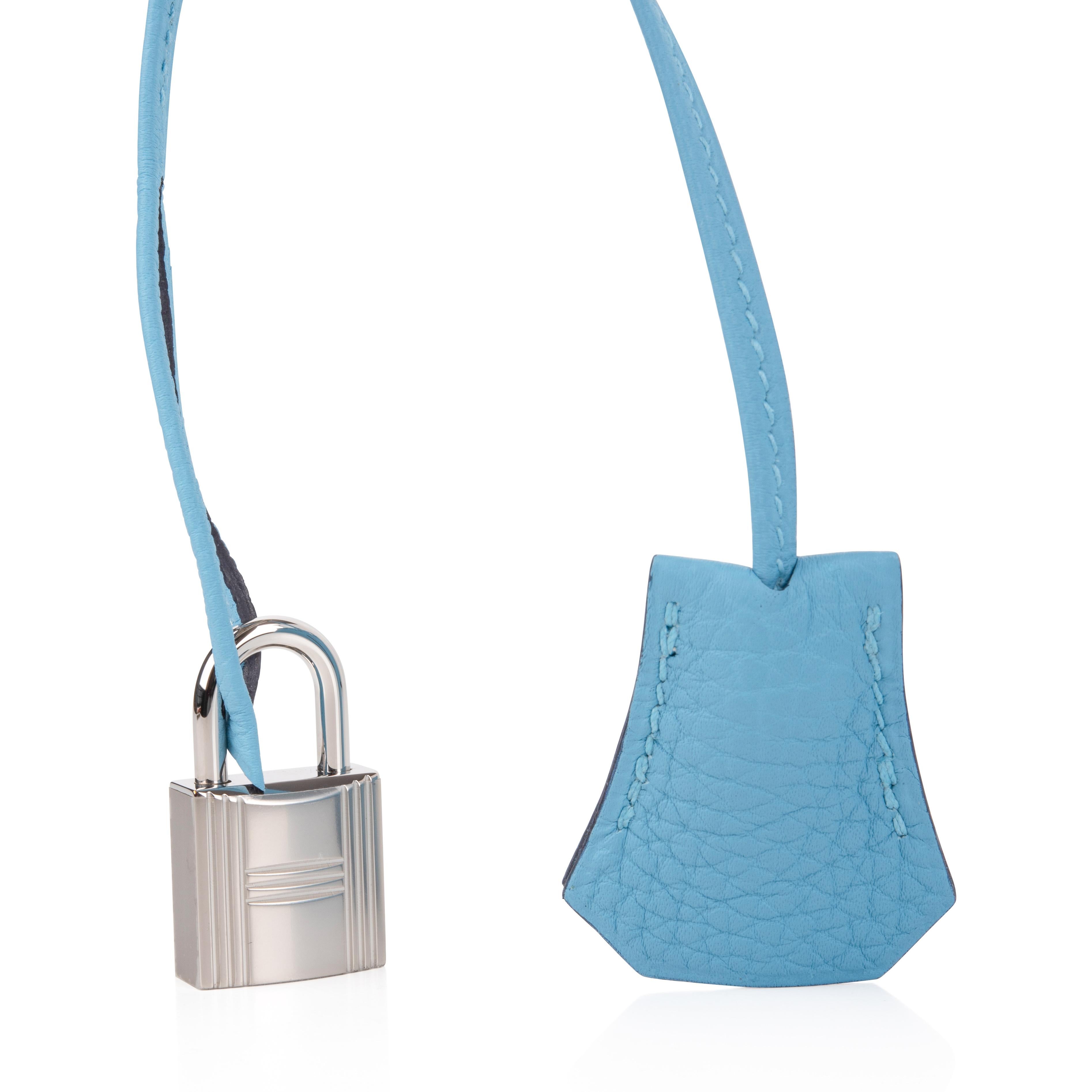 Mightychic offers a guaranteed authentic Hermes Birkin 30 bag featured in Bleu du Nord.
This beautiful sky blue is complimented with palladium hardware.
Togo leather has natural texture and is scratch resistant. 
Comes with the lock and keys in the