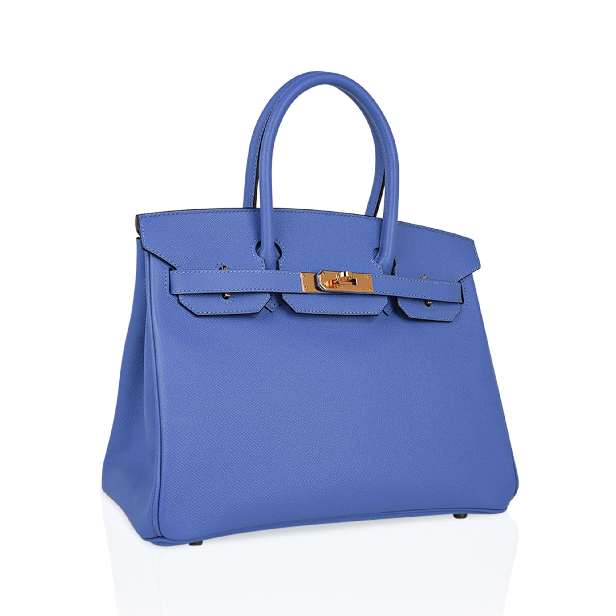 Mightychic offers a rare Hermes Birkin 30 Blue Paradis bag.
Featured in Epsom leather which holds the shape of the bag and is lighter in weight. 
Accentuated with rich gold hardware.
This no longer produced Blue Birkin bag will take you for year