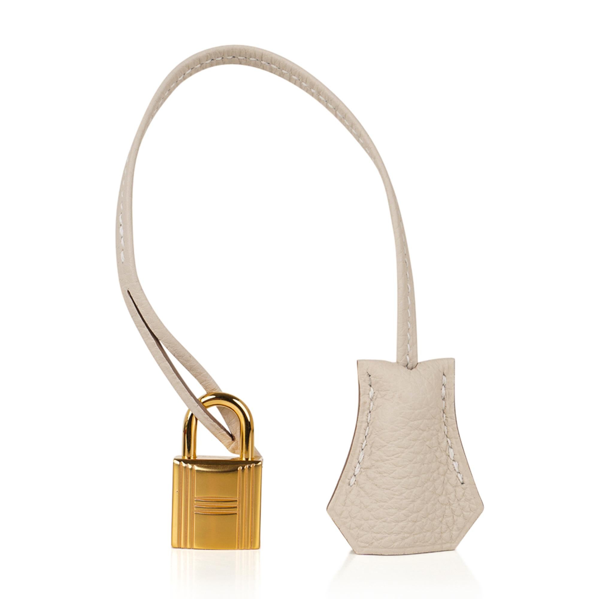 Guaranteed authentic Hermes Birkin 30 bag featured in neutral Craie with Gold hardware.
This beautiful combination is timeless.
Togo leather is supple and scratch resistant.
Craie is one of the most in demand neutral colours and beloved by Hermes