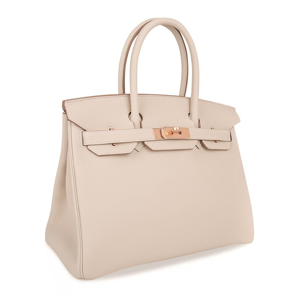 Mightychic offers an Hermes Birkin 30 bag featured in coveted Craie with Rose Gold hardware.
This rare beautiful combination is timeless.
Togo leather is supple and scratch resistant. 
This beauty will take you year round.
Comes with the lock and