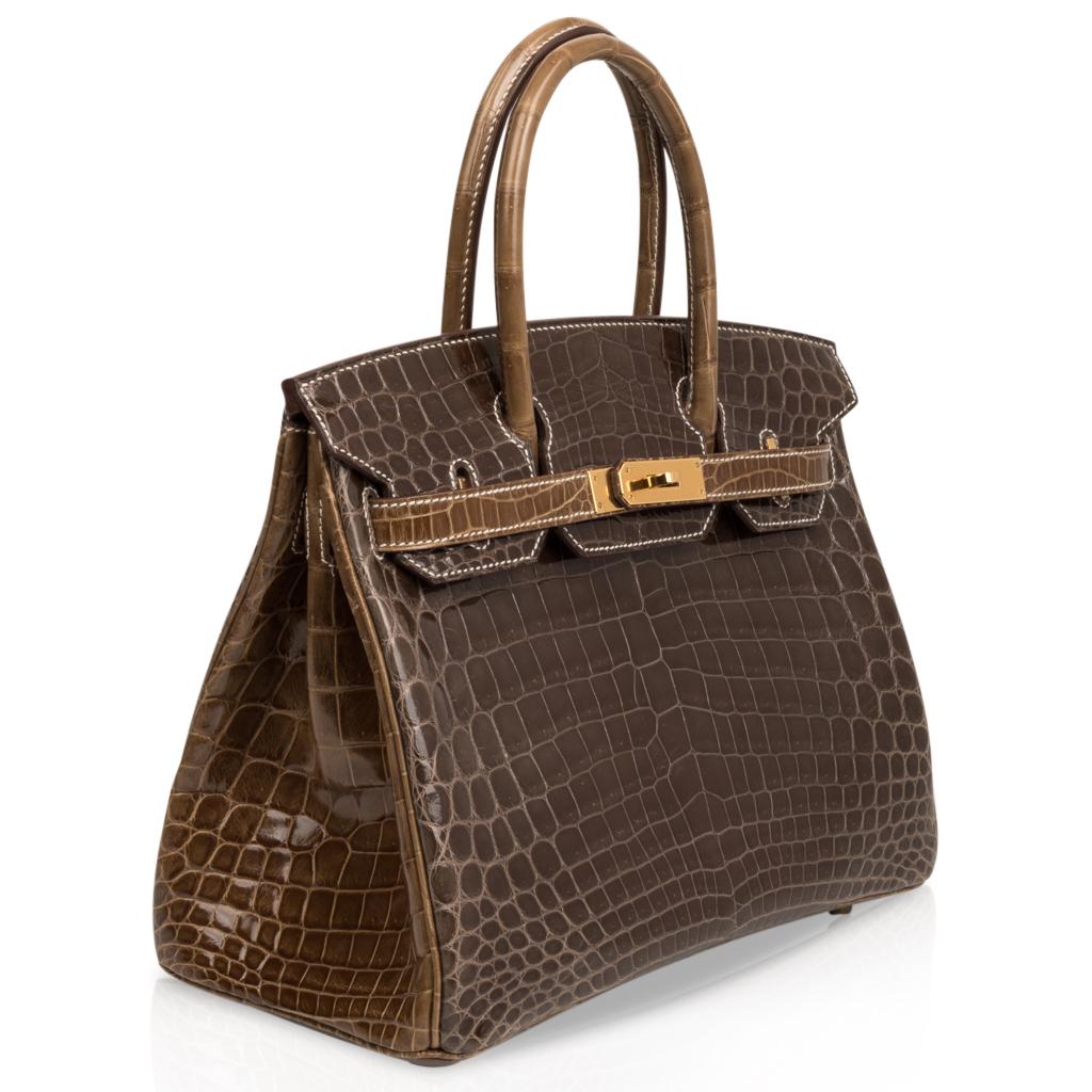 Mightychic offers an Hermes Birkin HSS 30 Crocodile bag featured in Gris Elephant with Ficelle.
Gris Elephant is the most exquisite grey with a subtle brown undertone.   And Ficelle is a warm toffee.
The combination is subtle, understated and beyond