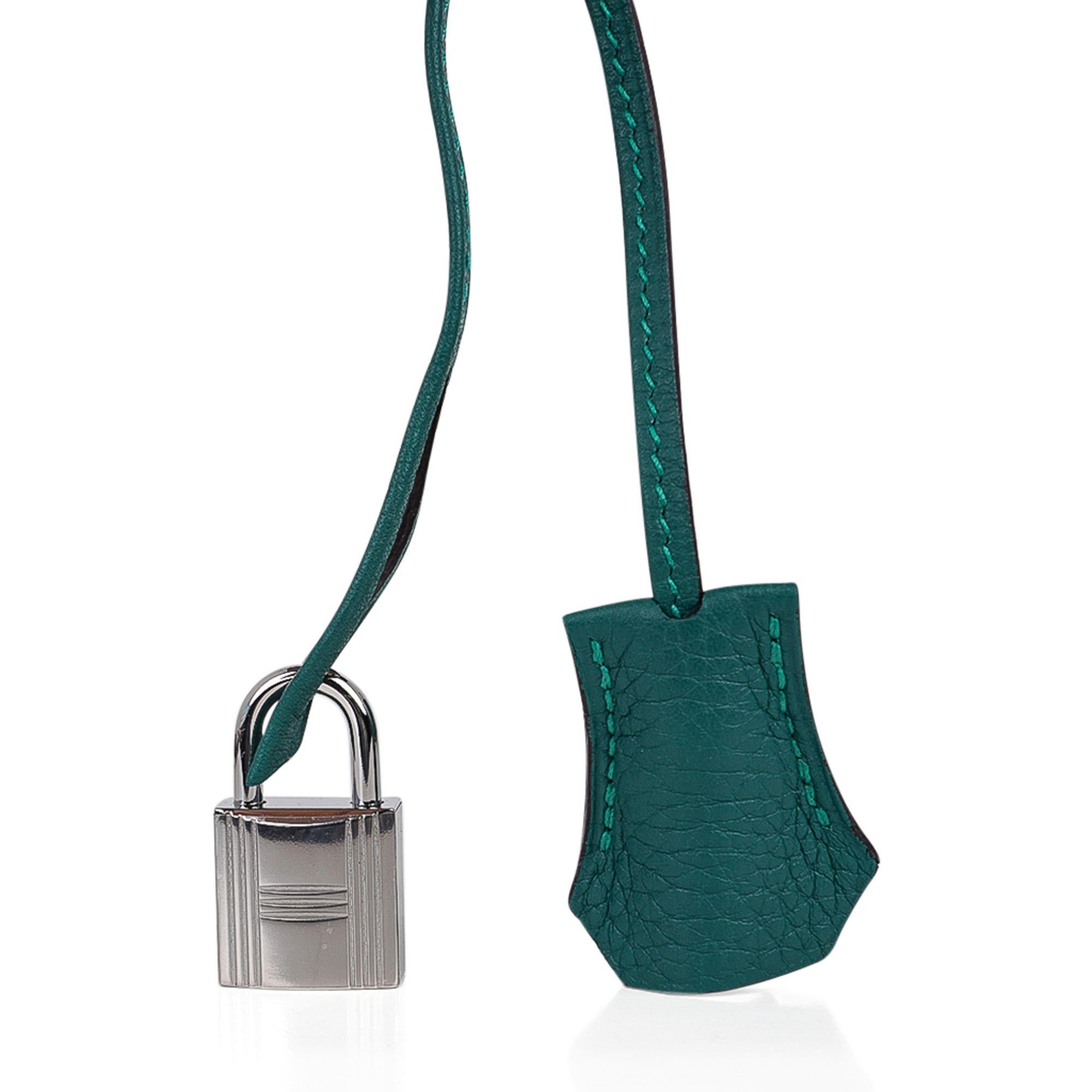 Mightychic offers an Hermes 30 Birkin bag features strikingly beautiful Malachite exotic green.
Clemence leather.
Fresh palladium hardware. 
Perfect day to dinner size!
NEW or NEVER WORN. 
Comes with lock, keys, clochette, sleeper, raincoat and
