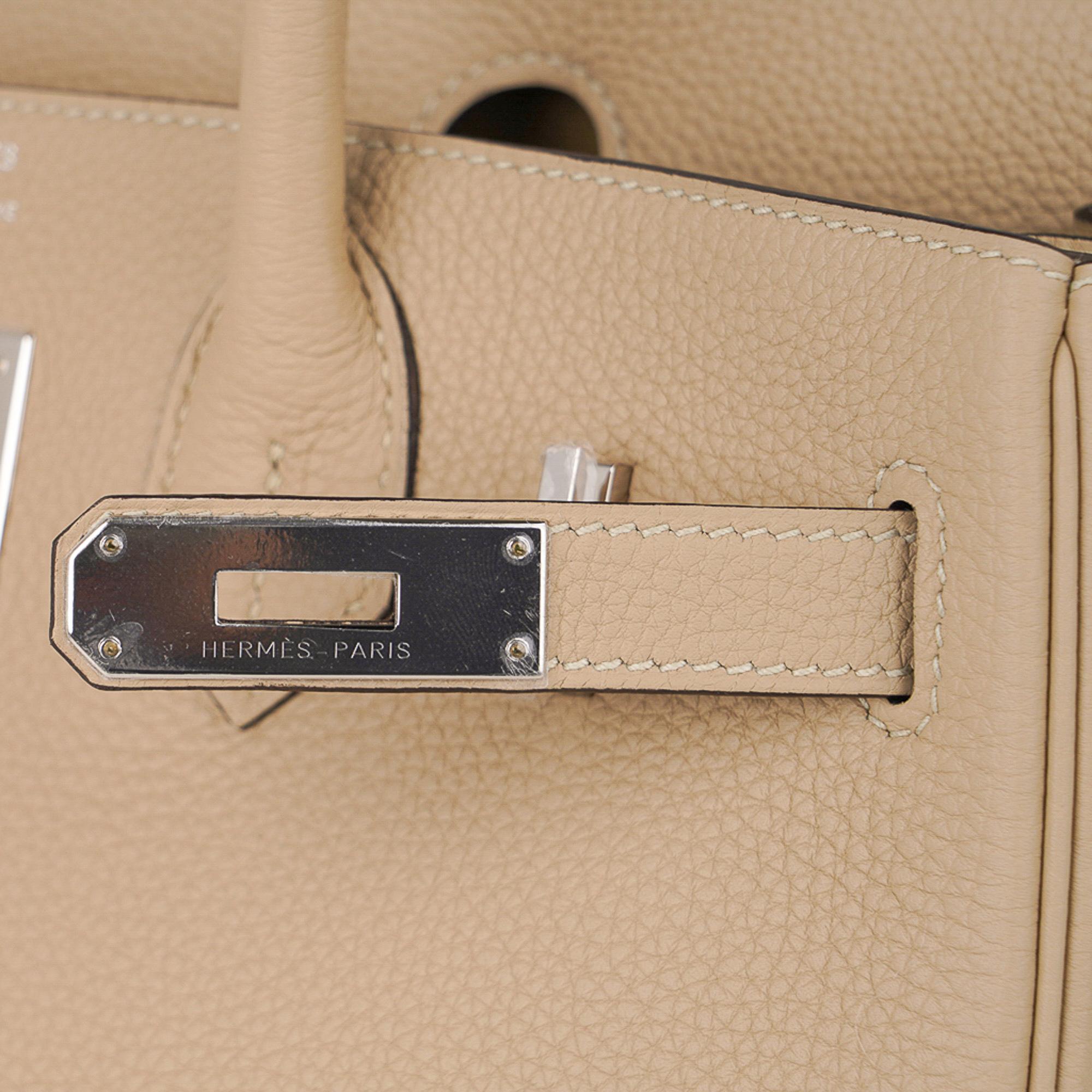 Guaranteed authentic Hermes 30 Birkin featured in neutral Trench.
Soft beige tone carries you year round.
Fresh with Palladium Hardware and togo leather.
NEW or NEVER WORN. 
Comes with the lock and keys in the clochette, sleepers, raincoat signature