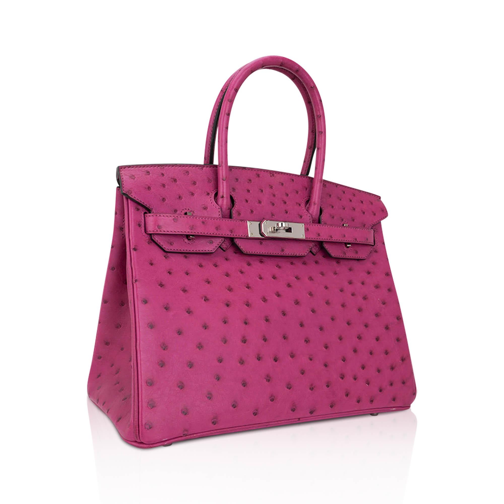 Mightychic offers an Hermes Birkin 30 Rose Poupre in rare ostrich.
Vivid pop all grown up pink with purple undertone to carry you all the way through fall / winter!
Fresh with Palladium hardware.
Comes with lock and keys and clochette, sleepers,