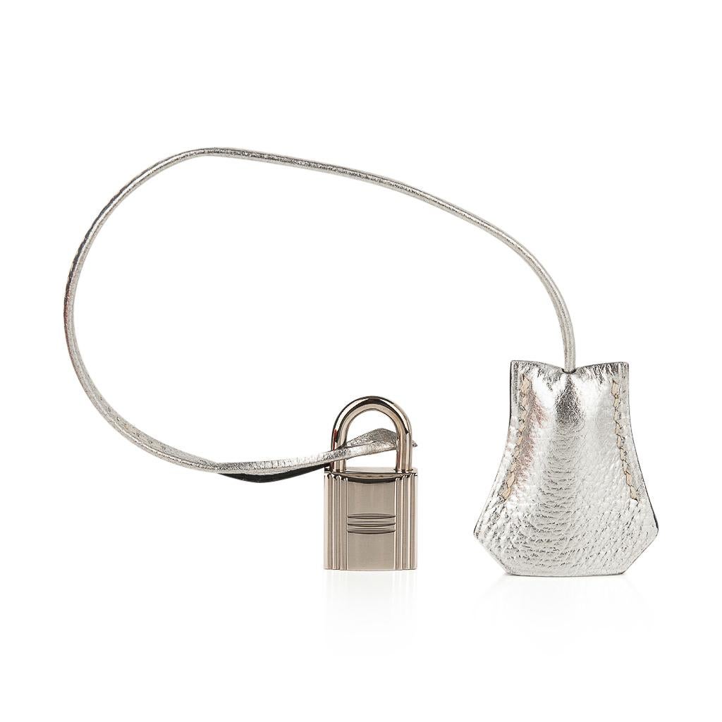 Mightychic offers an Hermes Birkin 30 bag features the unicorn Silver Metallic in Chevre leather.  
Show stopping and over the top fabulous! 
Palladium hardware. 
Body is in perfect condition with no creasing to the leather. 
Very light corner wear;