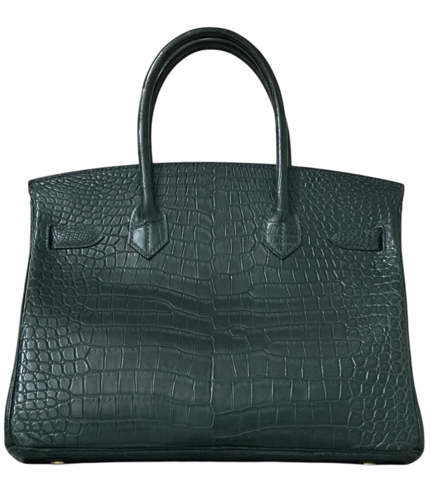 Hermès Birkin 30cm - Vert Foncé Porosus Krokodil mit Goldbeschlägen

Erleben Sie den Gipfel des Luxus mit dieser Hermès Birkin 30cm in Vert Foncé (Dunkelgrün), exquisit handgefertigt aus Porosus-Krokodil - dem begehrtesten und prestigeträchtigsten