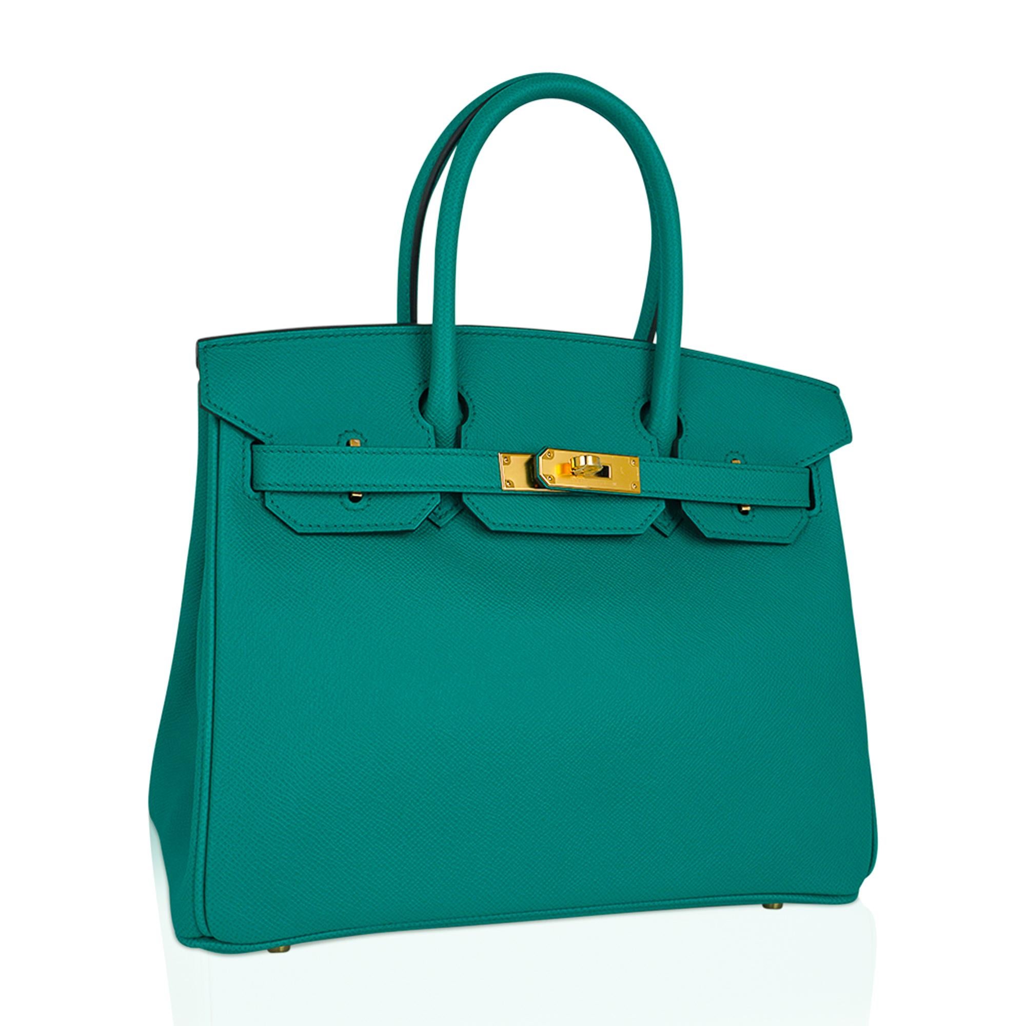 Mightychic offers an Hermes Birkin 30 bag featured in exquisite Vert Jade.
Epsom leather with rich gold hardware accentuates the beautiful colour of this Birkin bag.
This beauty will take you year round.
Comes with the lock and keys in the
