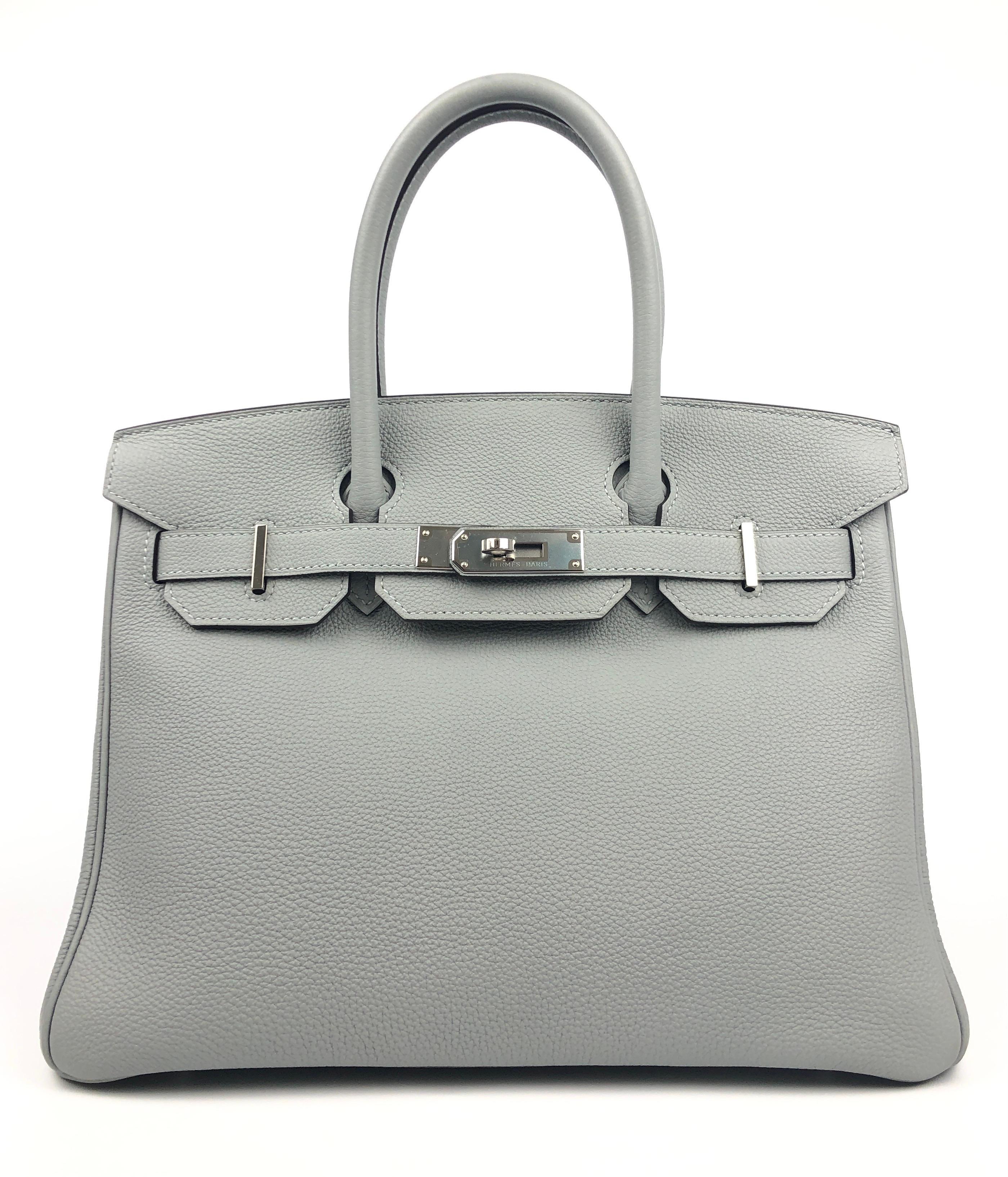RARE Stunning Hermes Birkin 30 Bleu Glacier Blue Gray Togo Palladium Hardware. Pristine Condition with Plastic on Hardware.

Shop with Confidence from Lux Addicts. Authenticity Guaranteed! 