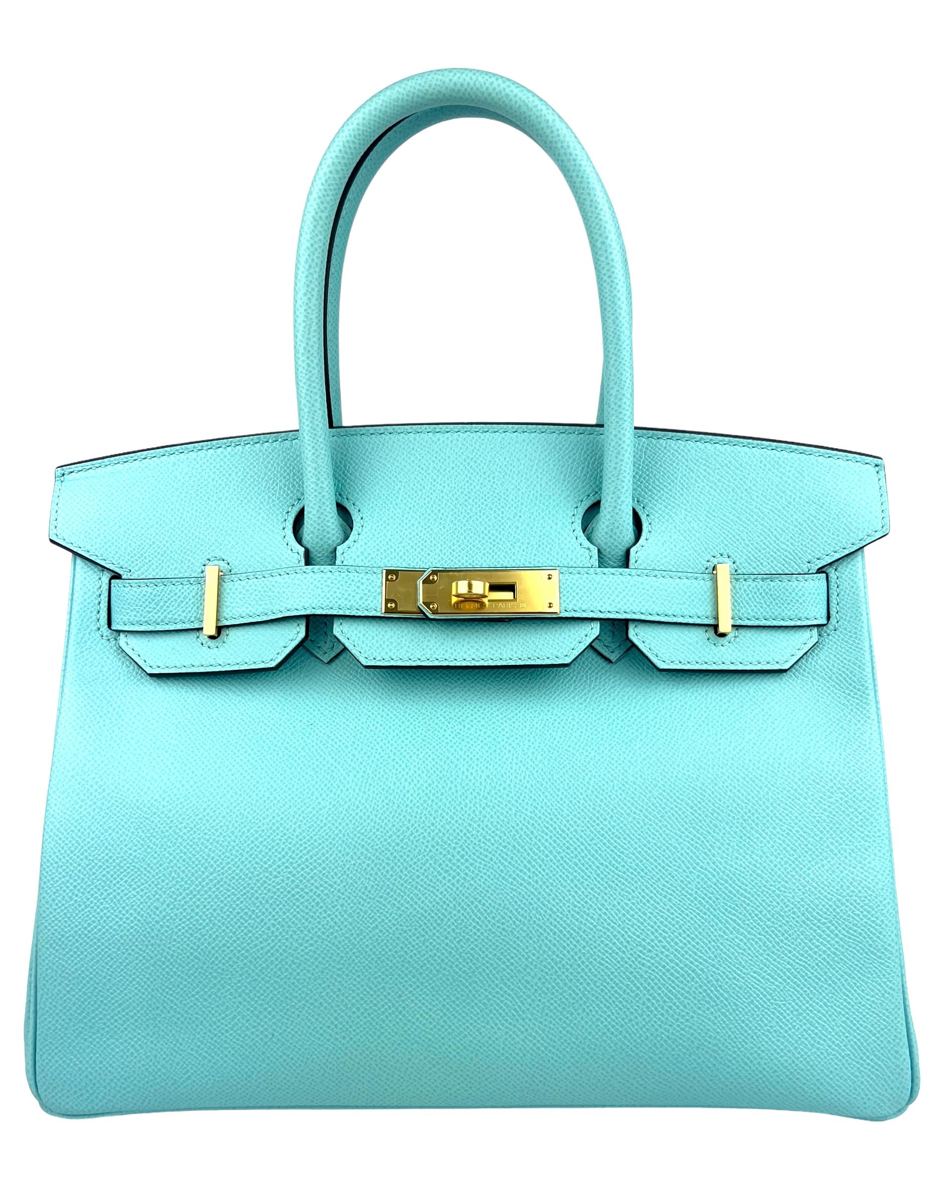 One of the most coveted colors. Stunning Hermes Birkin 30 Blue Atoll Epsom Gold Hardware. T Stamp 2015. Excellent Pristine Condition, Plastic on hardware, perfect corners and structure.

Shop with Confidence from Lux Addicts. Authenticity