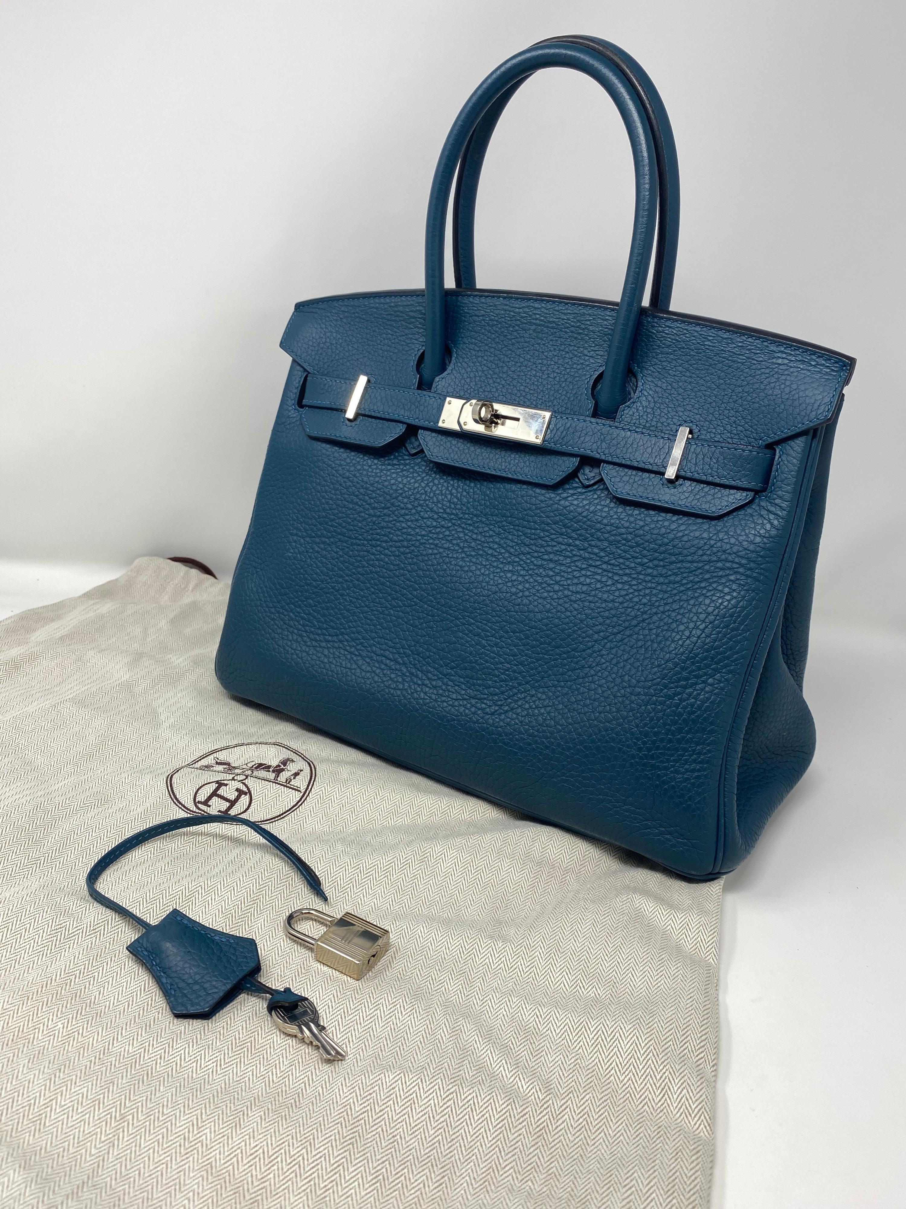 Hermes Birkin 30 Blue Colvert. Mint condition Birkin Bag. Highly coveted 30 size. Neutral blue color. Palladium hardware. Includes dust cover, clochette, and keys. Guaranteed authentic. 