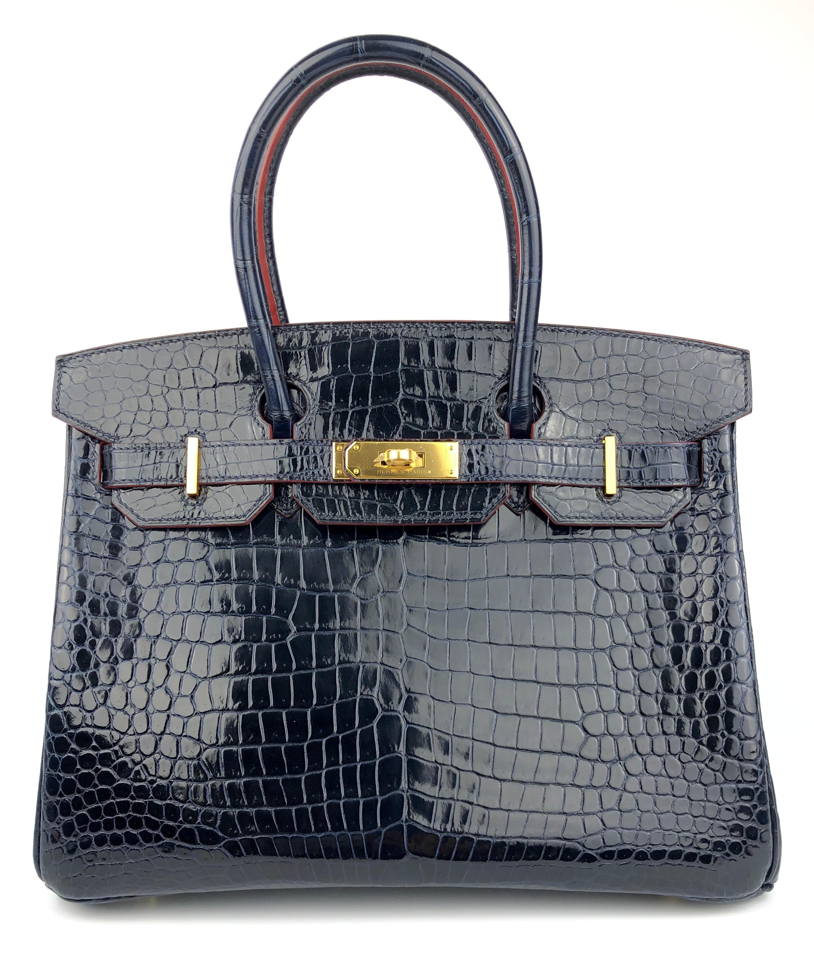 Absolutely Stunning RARE As New Hermes Birkin 30 Blue Marine Rouge H Contour Crocodile Skin Leather Gold Hardware. Plastic on all hardware and feet. 2016 X Stamp.

BEST PRICE ON THE MARKET GUARANTEED!

Shop with Confidence from Lux Addicts.