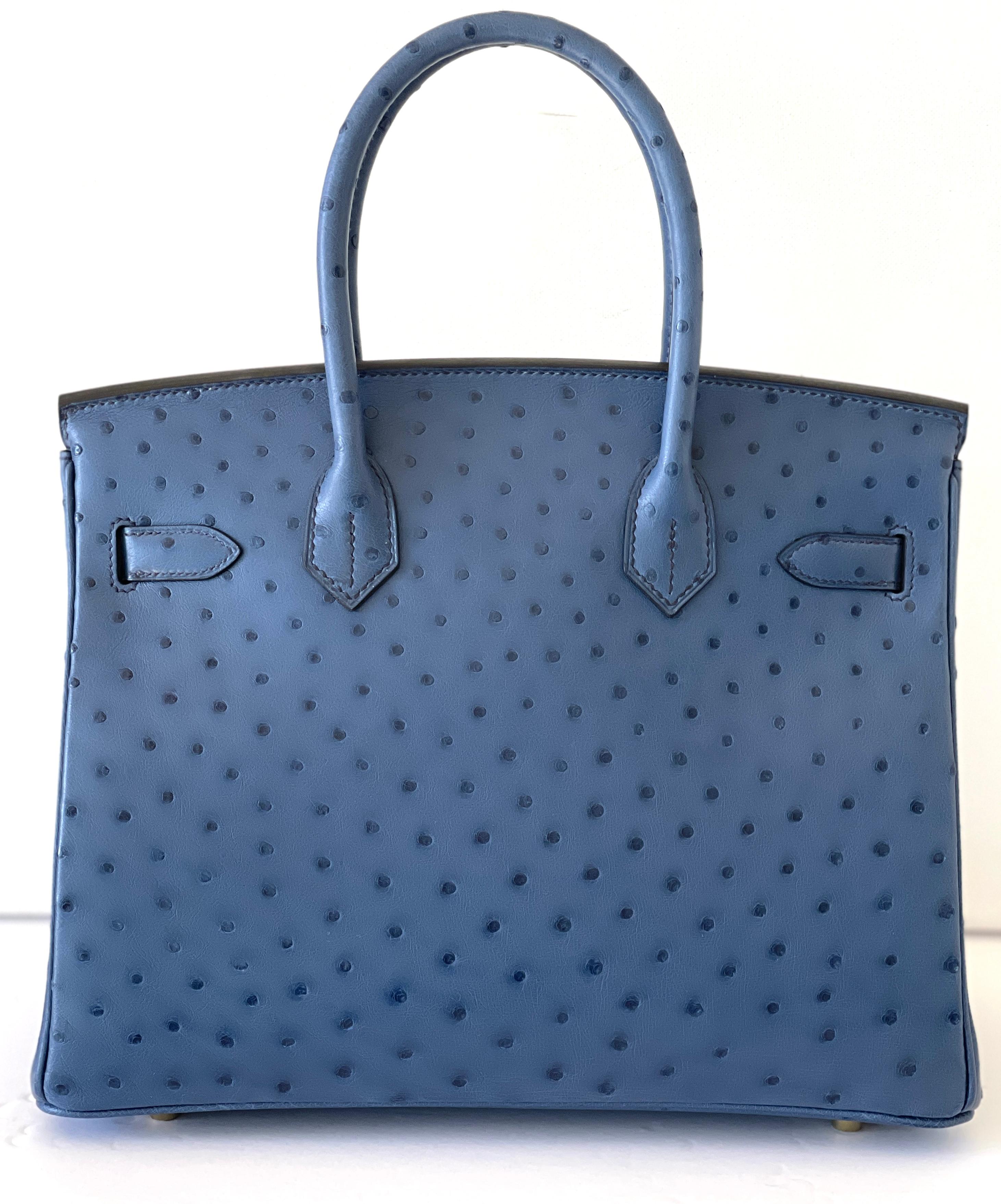 Hermes Blue Roi Ostrich 
Reintroduced color for 2021
Absolutely stunning!
Goes with so many other colors

This Birkin is in  ostrich leather with gold hardware and has tonal stitching, two straps with front toggle closure, a clochette with lock and
