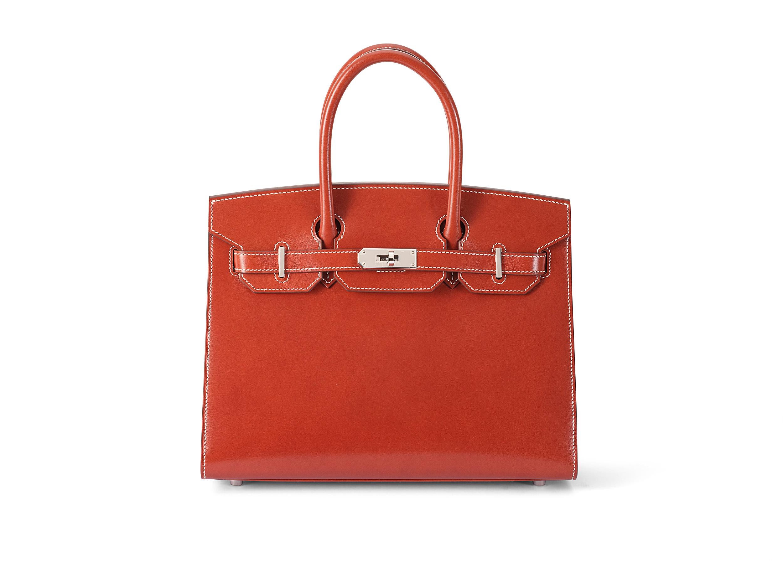 Hermès Birkin sellier 30 in brique with white stitching and boxcalf leather with palladium hardware. The bag is unworn and comes as full set including the original receipt. Stamp U (2022) 

