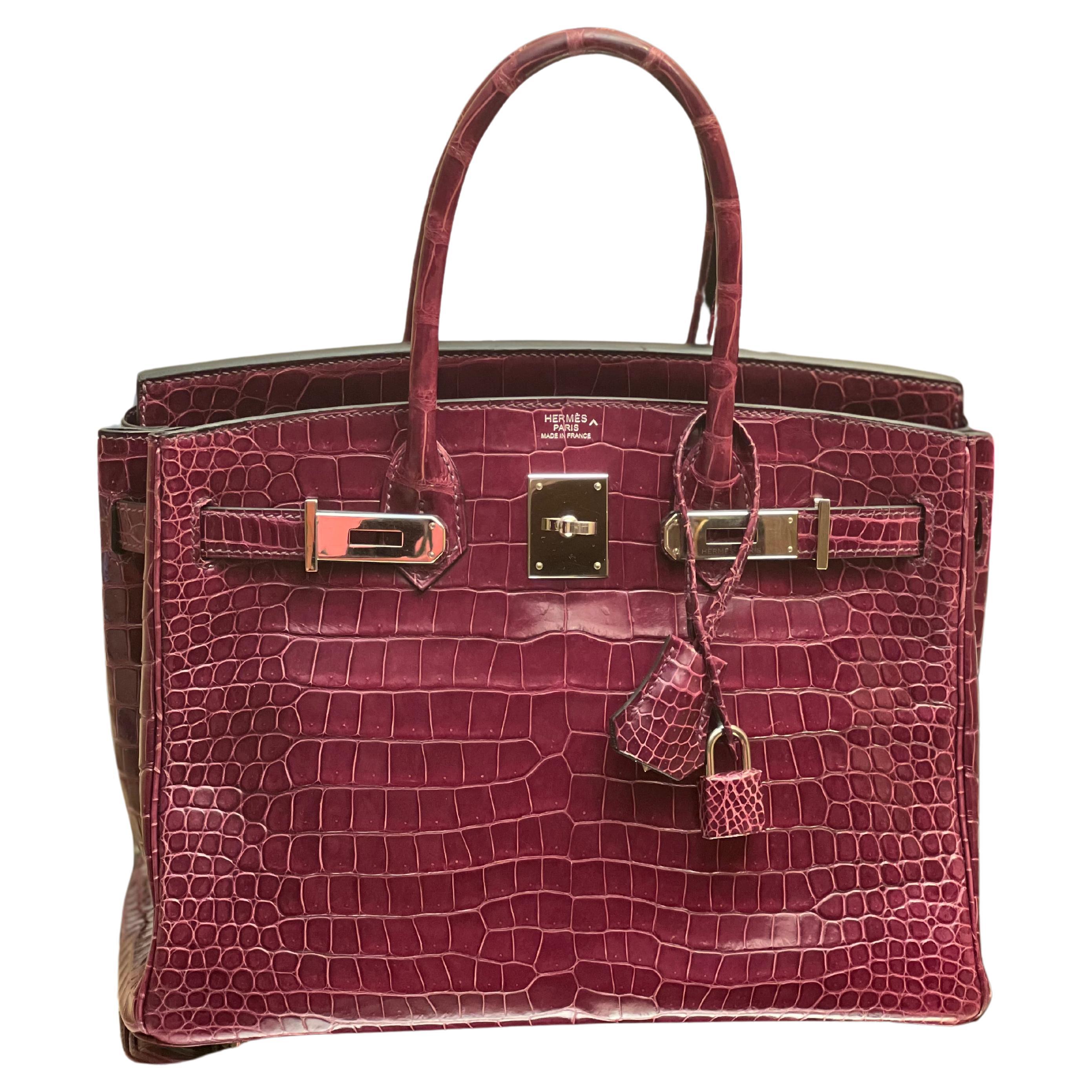 Beautiful purple Pre owned Hermes Birkin 30 crocodile Porosus bag. PHW. Comes with receipt, box, rain coat,clochette ,keys,locker and dust bag.
2014 year. Stamp R. 
Bag was at Hermes store and had make-up finishing, has invoice as well from Hermes