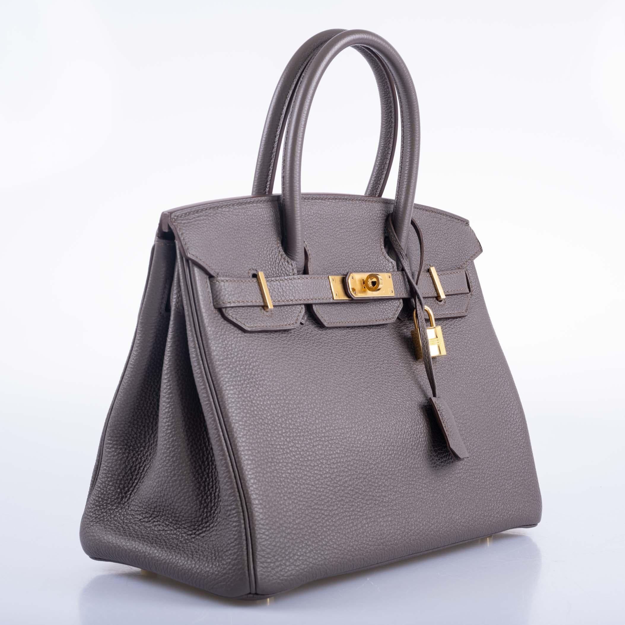 Every discerning woman with a taste for luxury deserves to have a signature Birkin in her collection. The Hermès Birkin 30cm in the distinguished 'Etain' color is a truly remarkable choice. Its name, derived from the French word for 'tin', belies