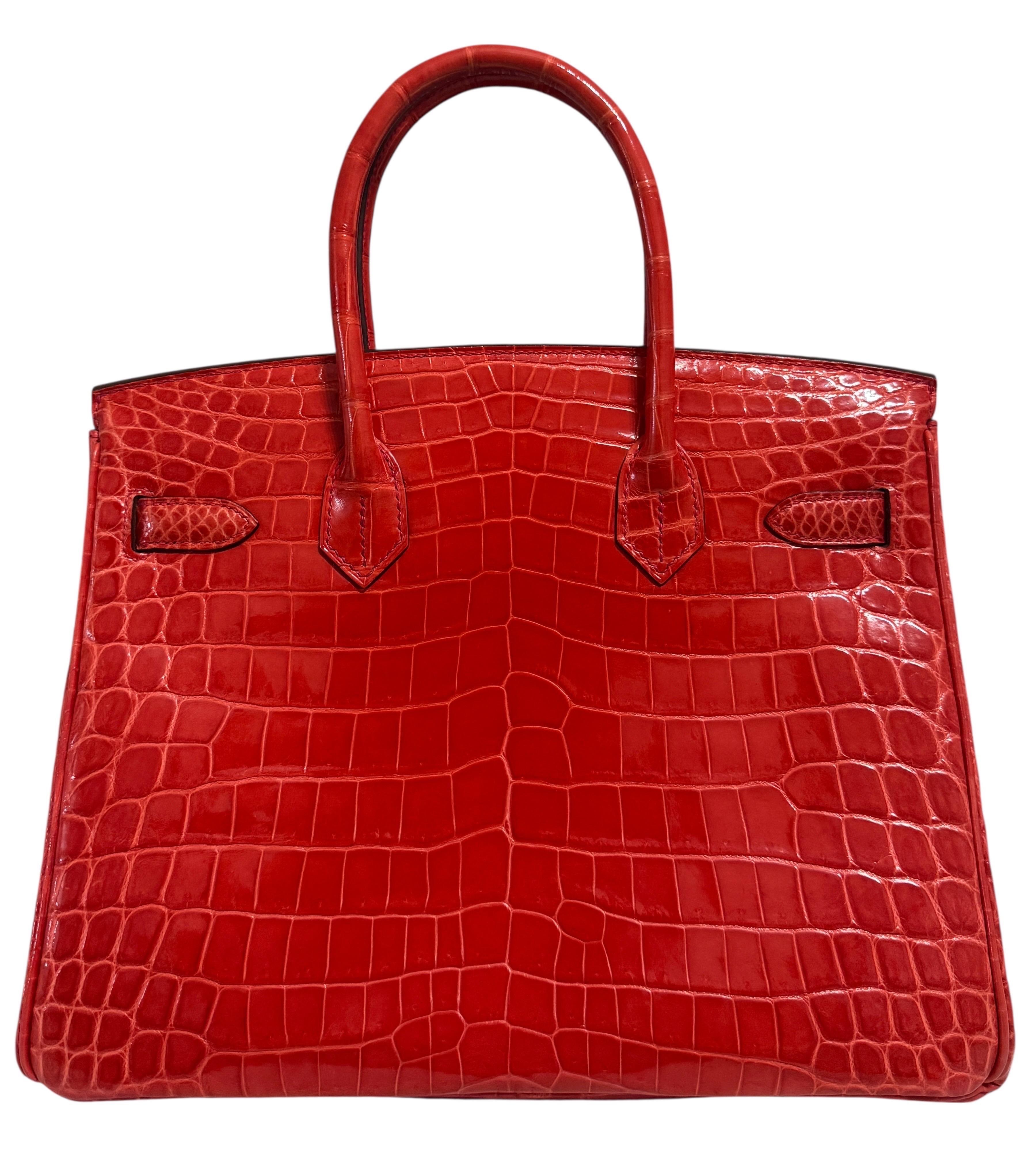 Absolut atemberaubende seltene Hermes Birkin 30 Geranium Niloticus Krokodilleder ergänzt durch Gold Hardware . 

Pristine Condit mit Kunststoff auf Hardware.

Bitte beachten Sie, dass es sich um einen gebrauchten Artikel handelt, die Tasche wurde
