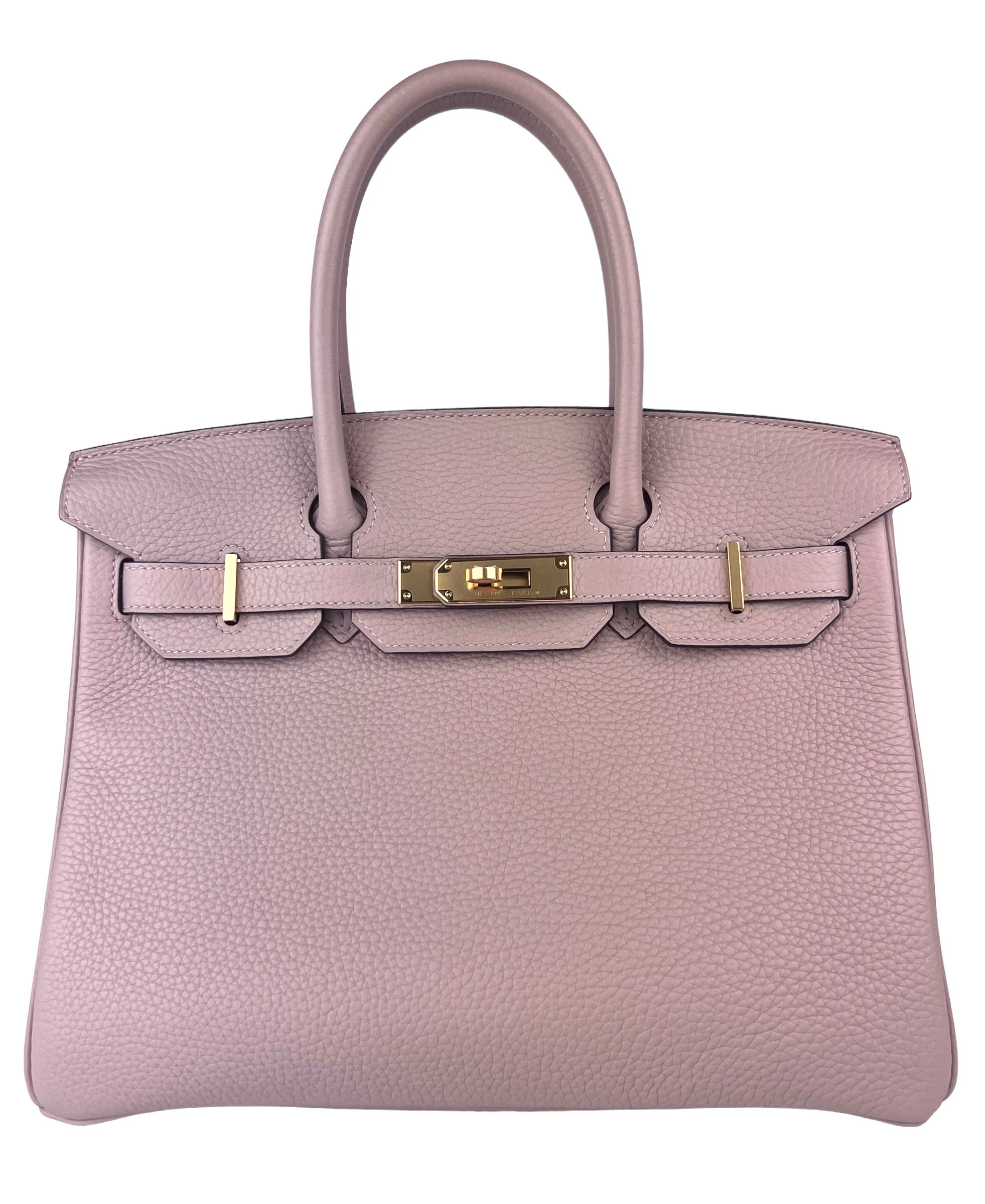 Ultra Rare Absolutely Stunning Hermes Birkin 30 Glycine Togo Leather, Complimented by Gold Hardware. Pristine Condition with plastic on all Hardware. Excellent corners and structure. 

Please keep in mind that this is a pre owned item, the bag has