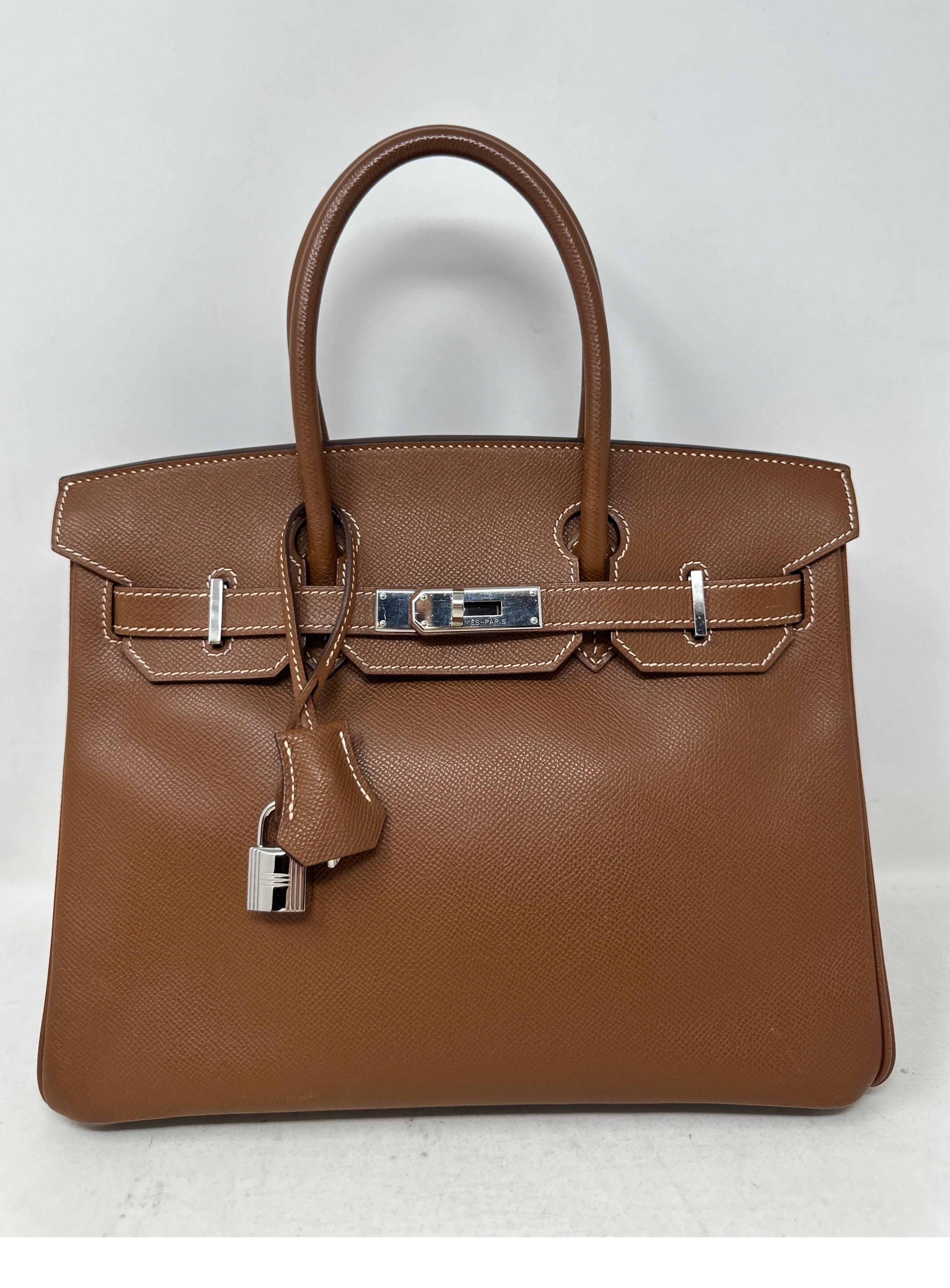 Hermes Gold Birkin 30 Bag. Palladium hardware. Epsom leather. Excellent condition. Interior clean. Gold tan color with contrast white stitching. Classic combination. The most wanted size 30 Birkin. Includes clochette, lock, keys, and dust bag.