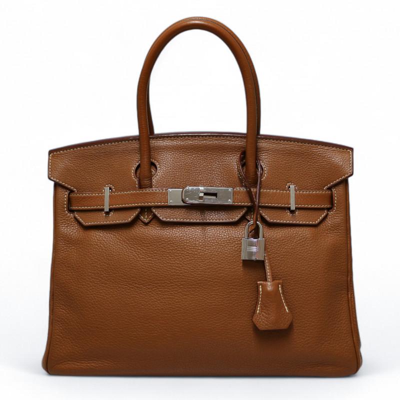 Beautiful Birkin bag size 30 in rare leather Taurillon Clémence

Condition : very good
Made in France
Material : leather Taurillon Clémence
Interior : gold leather
Color : gold
Dimensions : 30 x 23 x 15 cm
Letter : L in a square
Year : 2008
Hardware