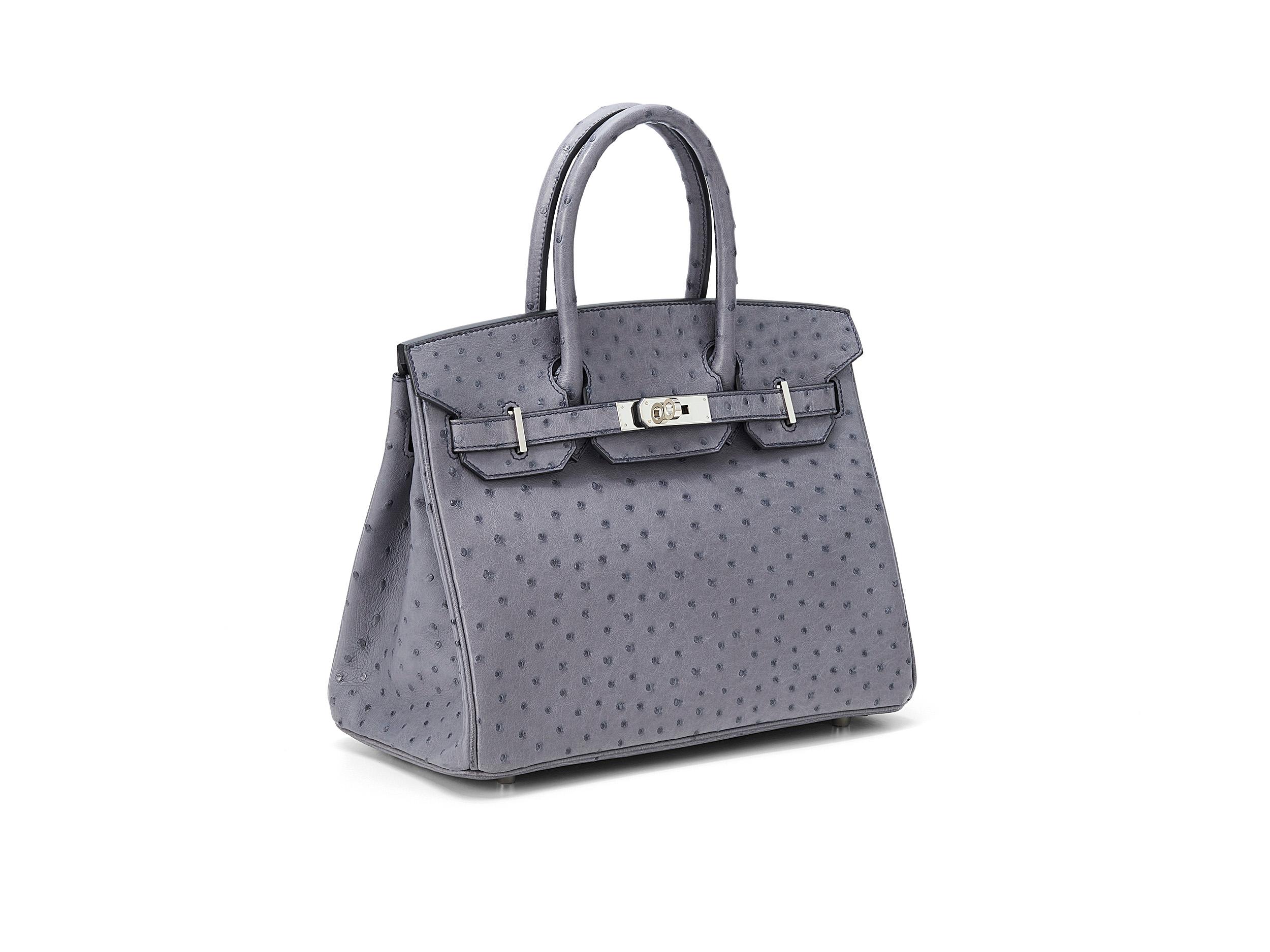 Hermès Birkin 30 in gris agathe and ostrich leather with palladium hardware. The bag is unworn but the plastic protection has been removed and there are very minor scratches on the hardware.  Comes as full set, but without the receipt.
Stamp X