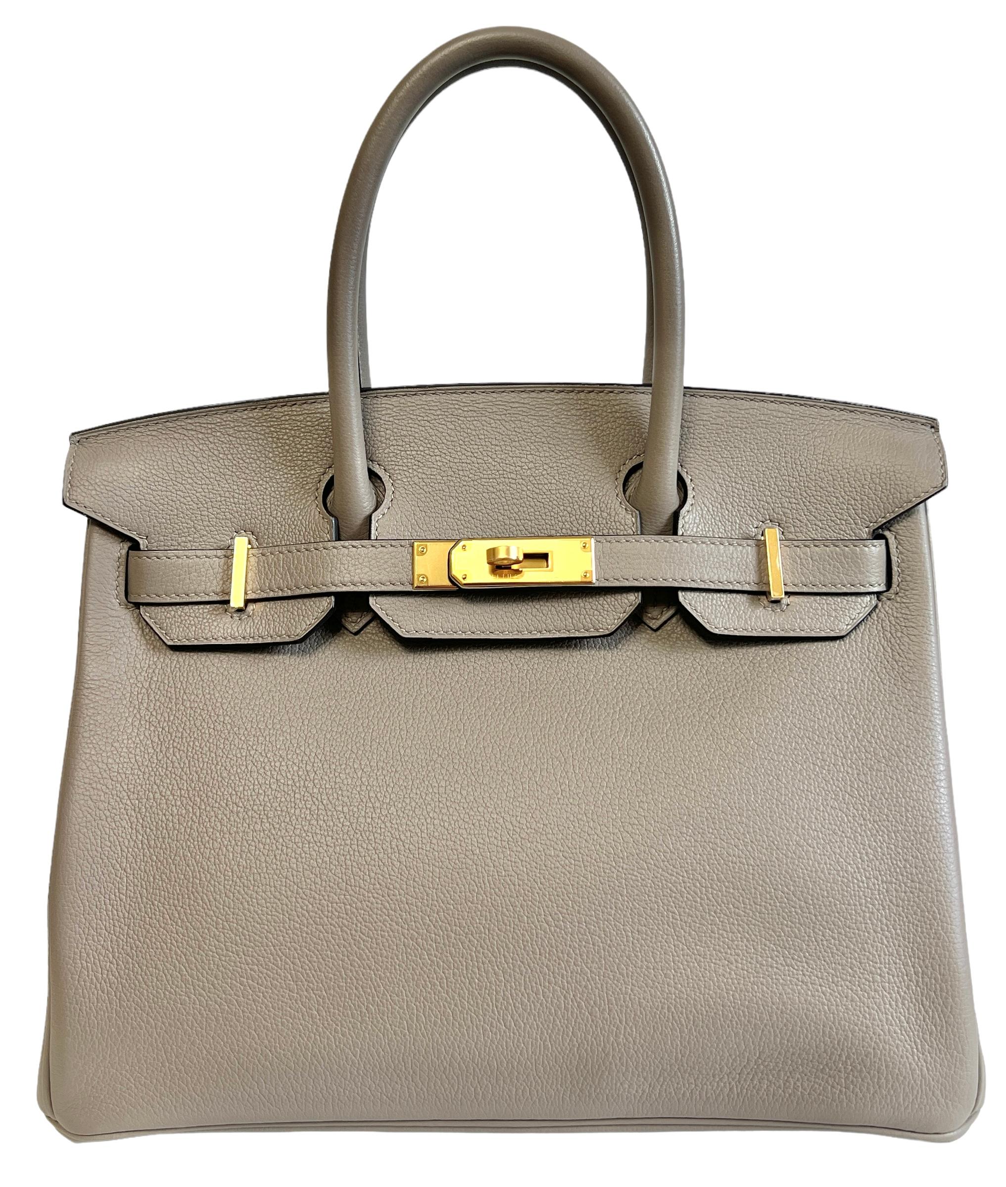 Absolutely Stunning Rare 2020 Hermes Birkin 30 Gris Asphalt Novillo Leather complimented by Gold Hardware. Like New Condition with plastic on all hardware. Y Stamp 2020. 

Shop with Confidence from Lux Addicts. Authenticity Guaranteed! 

