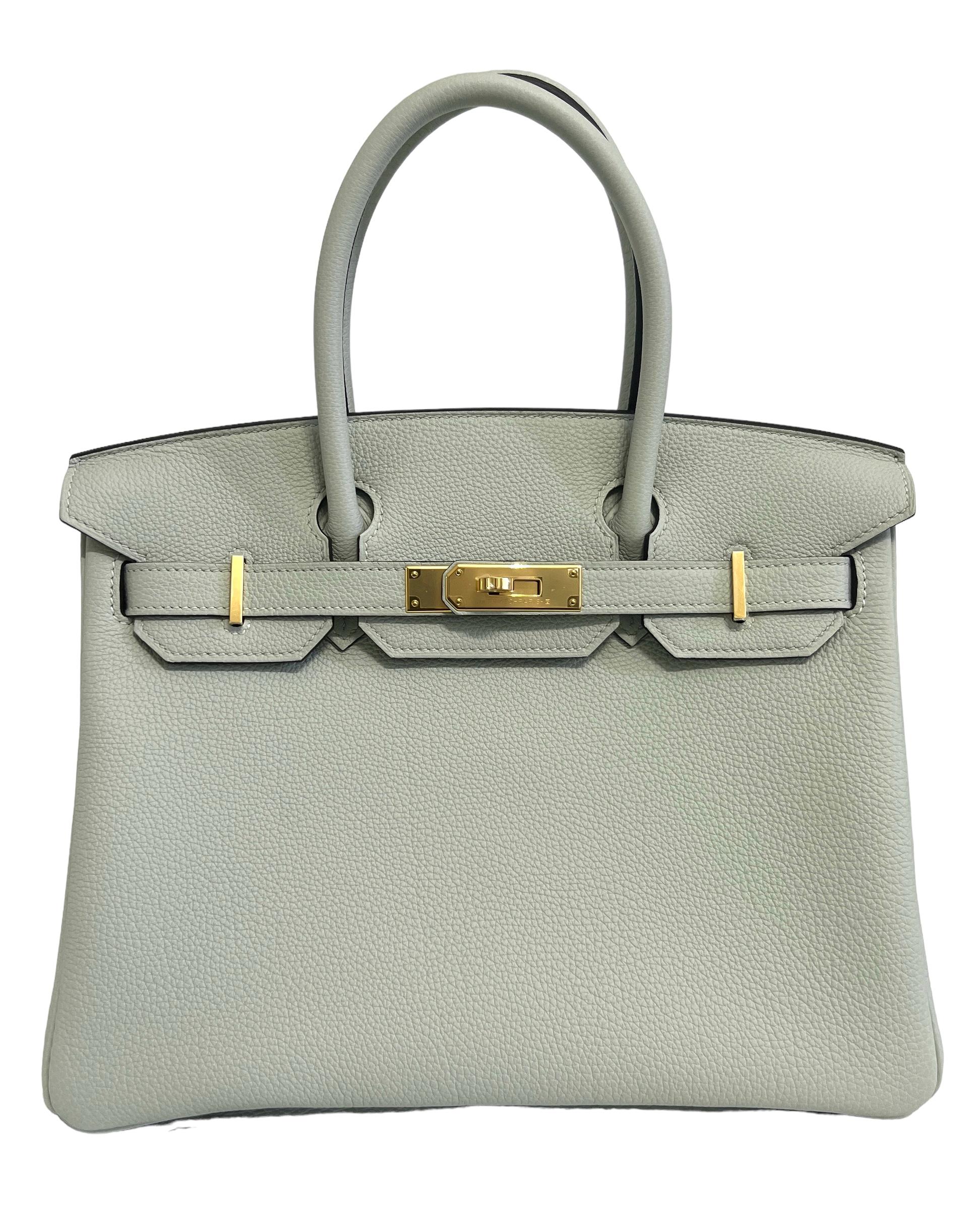 Absolutely Stunning Rare New 2023 Hermes Birkin 30 Gris Neve Togo Leather complimented by Gold Hardware. B Stamp 2023. BRAND NEW COLOR!

Shop with Confidence from Lux Addicts. Authenticity Guaranteed! 

Lux Addicts is a Premier Luxury Dealer and one