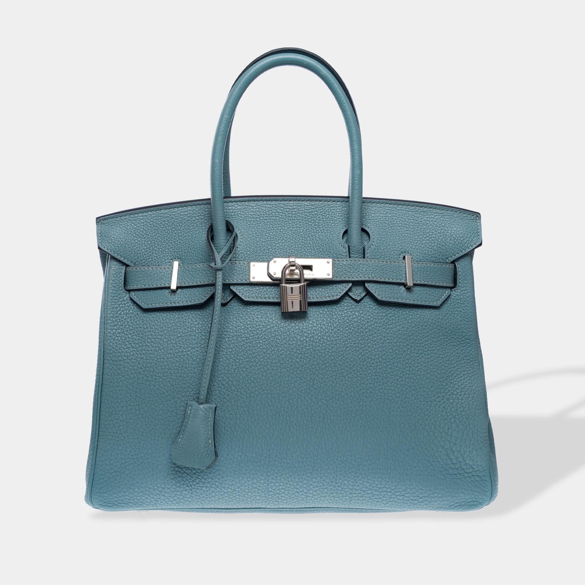 Beautiful​ ​Hermes​ ​Birkin​ ​30​ ​handbag​ ​in​ ​Bleu​ ​Ciel​ ​Togo​ ​calf​ ​leather,​ ​palladium​ ​silver​ ​metal​ ​trim,​ ​double​ ​blue​ ​leather​ ​handles​ ​allowing​ ​for​ ​hand​ ​carry

Flap​ ​closure
Interior​ ​lining​ ​in​ ​blue​ ​leather,​