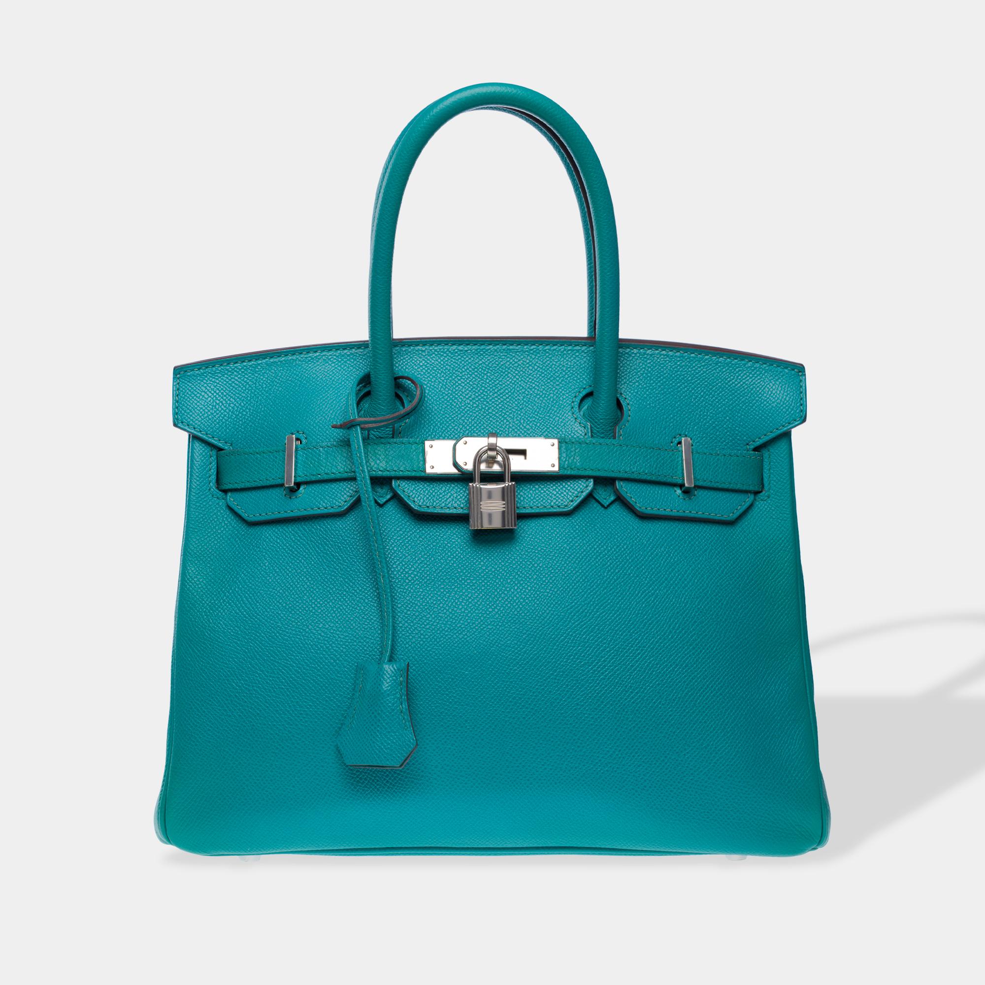 Beautiful​ ​Hermes​ ​Birkin​ ​30​ ​handbag​ ​in​ ​Bleu​ ​Paon​ ​Epsom​ ​calf​ ​leather,​ ​palladium​ ​silver​ ​metal​ ​trim,​ ​double​ ​blue​ ​leather​ ​handle​ ​allowing​ ​a​ ​hand​ ​carry

Flap​ ​closure
Inner​ ​lining​ ​in​ ​green​ ​leather,​