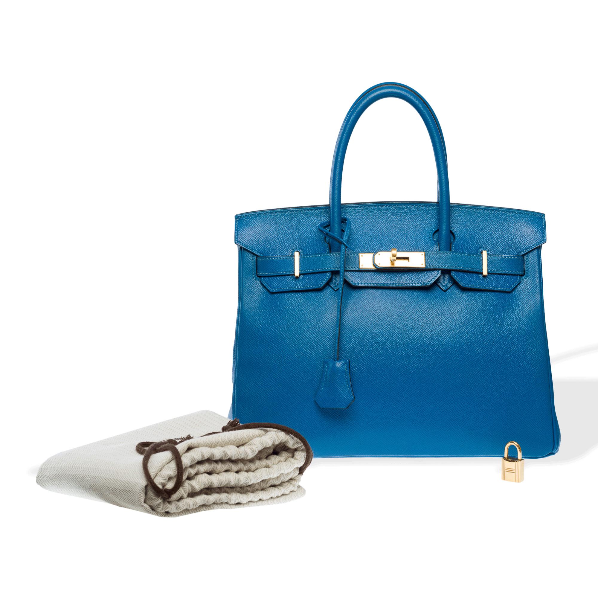 Exceptional​ ​Hermes​ ​Birkin​ ​30​ ​handbag​ ​in​ ​blue​ ​Izmir​ ​Epsom​ ​calf​ ​leather,​ ​gold​ ​plated​ ​metal​ ​trim,​ ​double​ ​blue​ ​leather​ ​handles​ ​for​ ​hand​ ​carry
Flap​ ​closure
Blue​ ​leather​ ​interior​ ​lining,​ ​one​ ​zip​