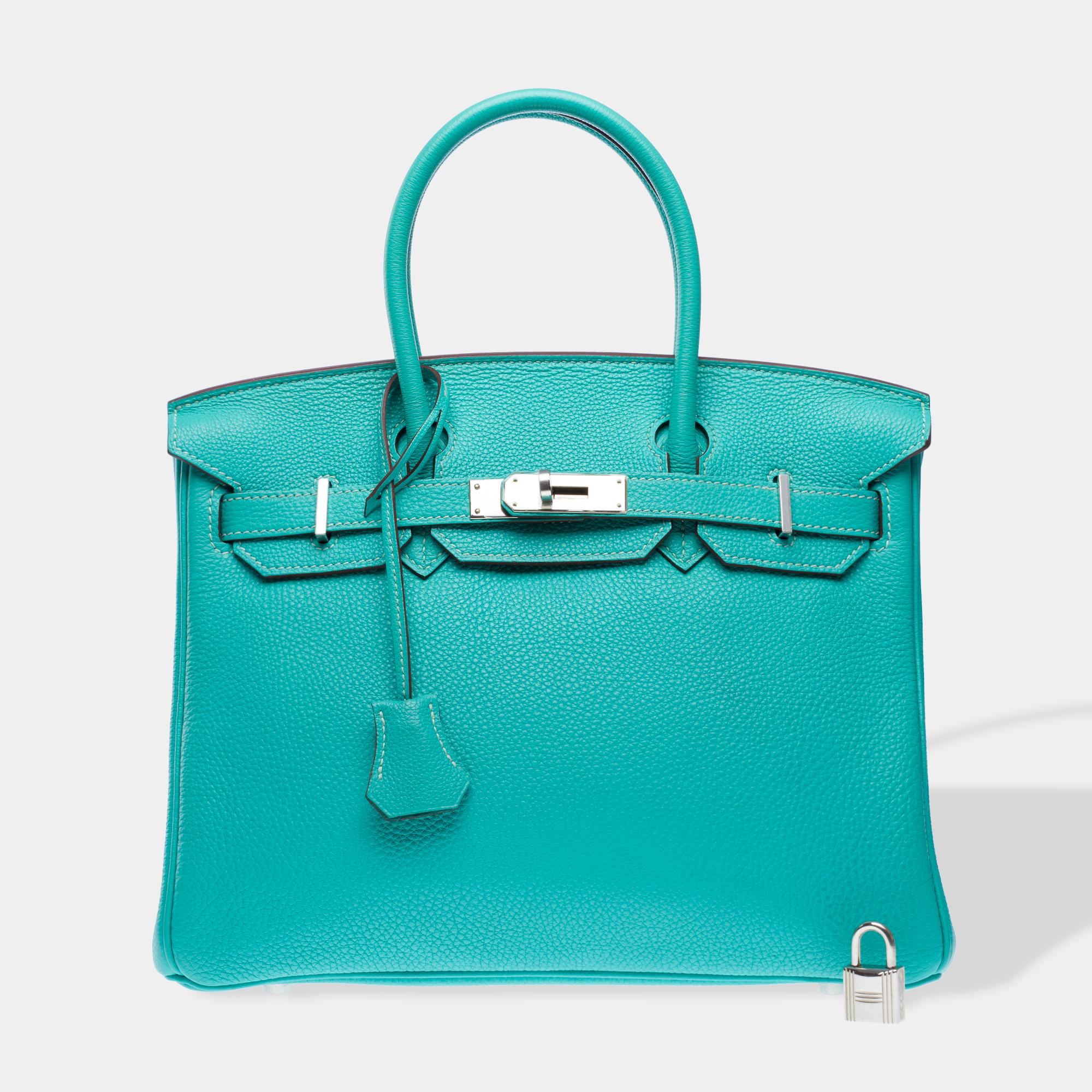 Beautiful​ ​Hermes​ ​Birkin​ ​30​ ​handbag​ ​in​ ​Togo​ ​Blue​ ​Lagoon​ ​calfskin​ ​leather,​ ​silver​ ​palladium​ ​metal​ ​trim,​ ​double​ ​blue​ ​leather​ ​handles​ ​for​ ​hand​ ​carry

Flap​ ​closure
Blue​ ​leather​ ​interior​ ​lining,​ ​one​