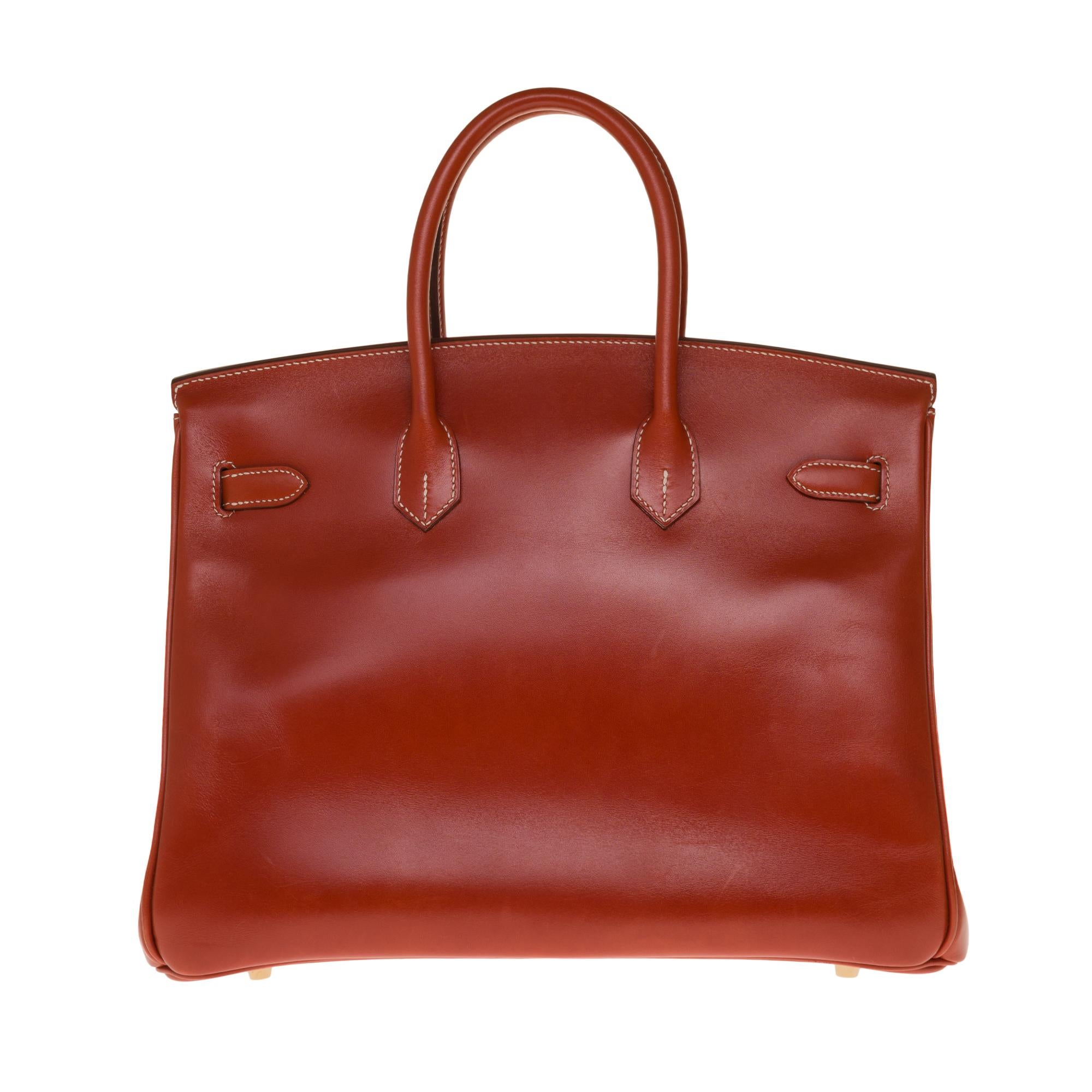 Exceptional & Rare handbag Hermes Birkin 30 cm in brick calfskin box leather with white stitching, gold plated metal hardware, double handle in leather box brick allowing a handheld

Flap closure
Inner lining in brick leather, one zip pocket, one