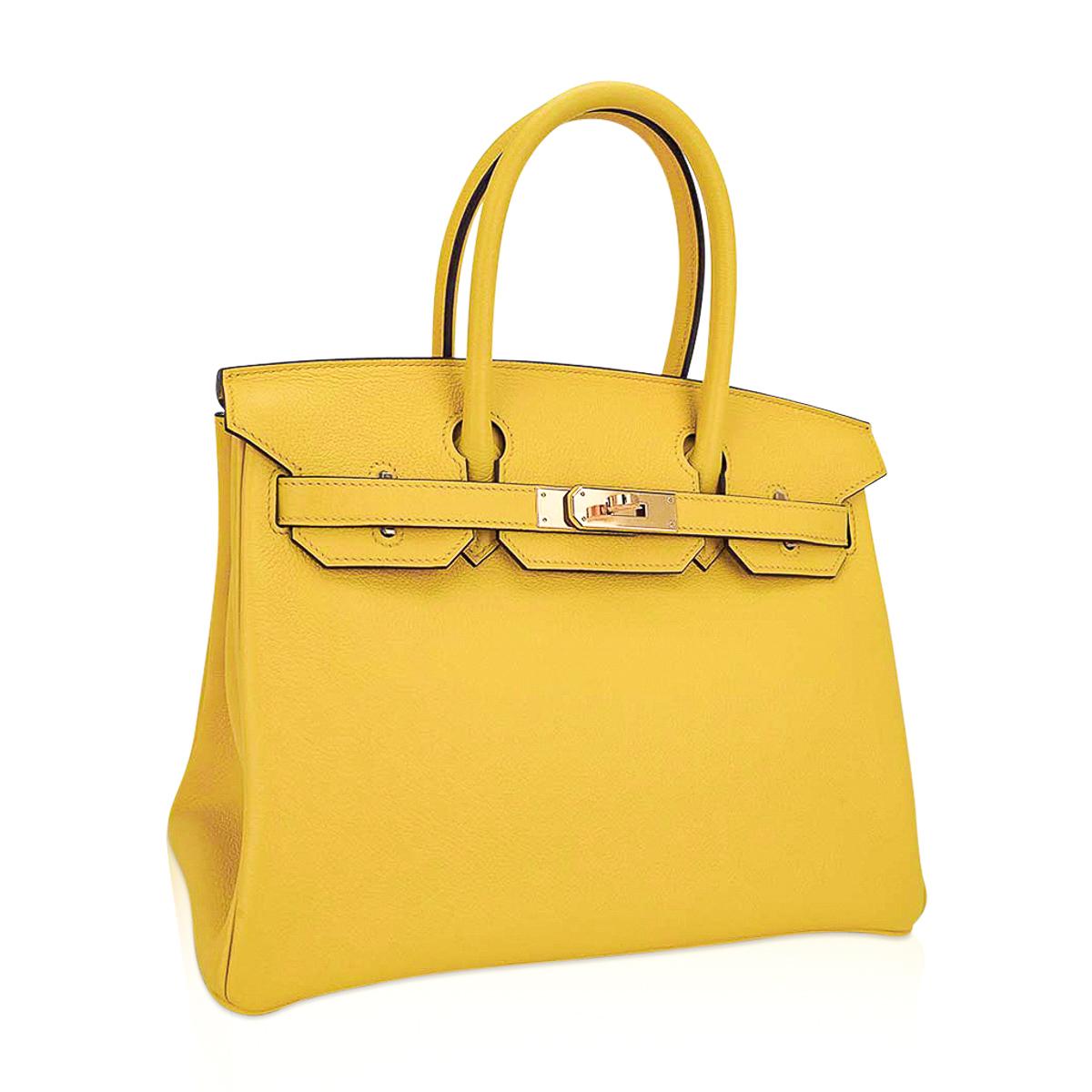 Mightychic offers an Hermes Birkin 30 bag featured in sunny Jaune de Naples.
This sought after Hermes Birkin bag is exquisite in Novillo leather.
Accentuated with lush gold hardware.
Comes with the lock and keys in the clochette, sleepers, raincoat