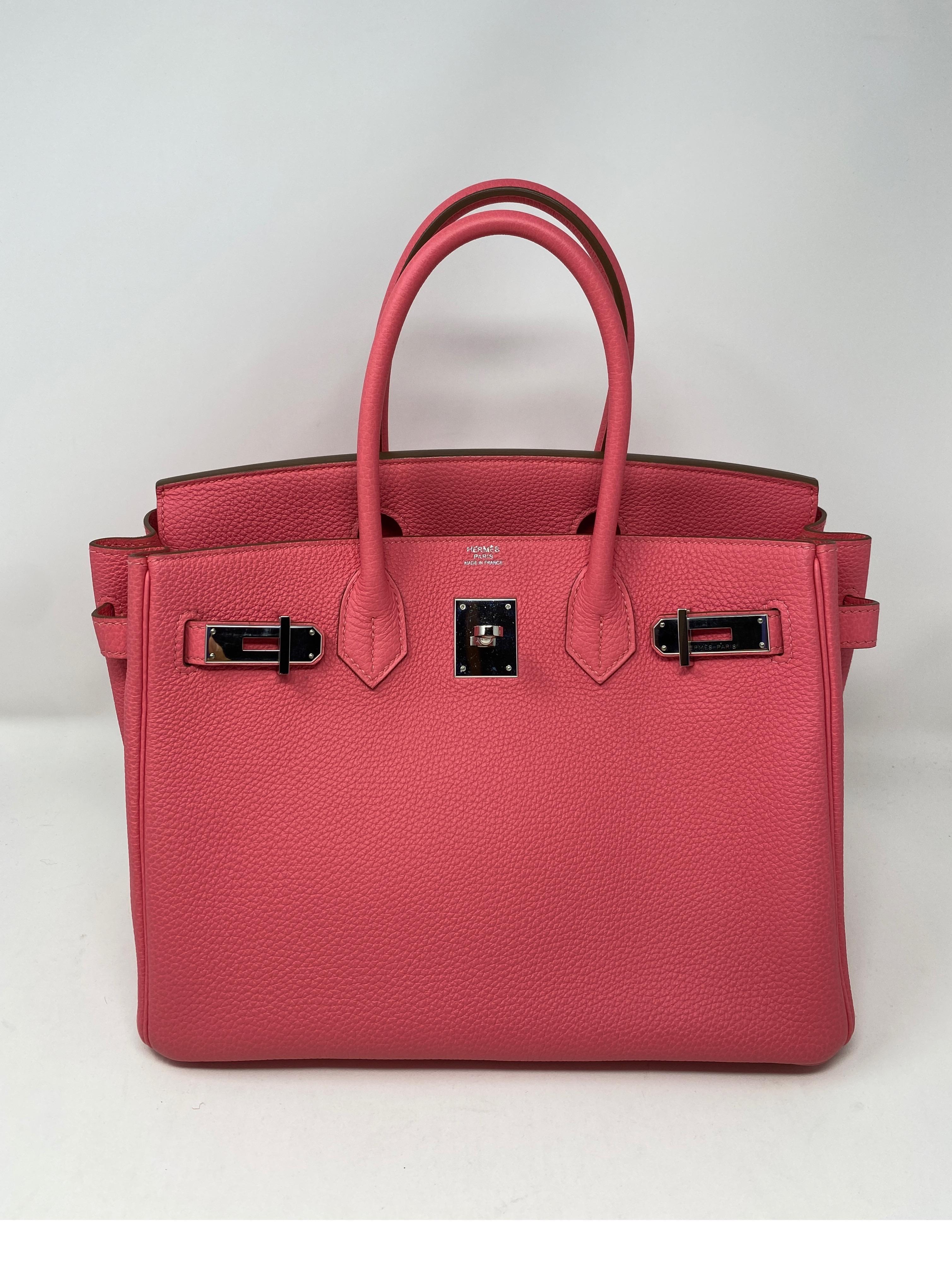 Hermes Rose Lipstick Birkin 30 Bag. Palladium hardware. The most coveted size for Birkin bags. Beautiful bubble gum pink color. Rare color. Mint like new condition. Looks like new. Never worn. Interior pristine. Includes clochette, lock, keys, and