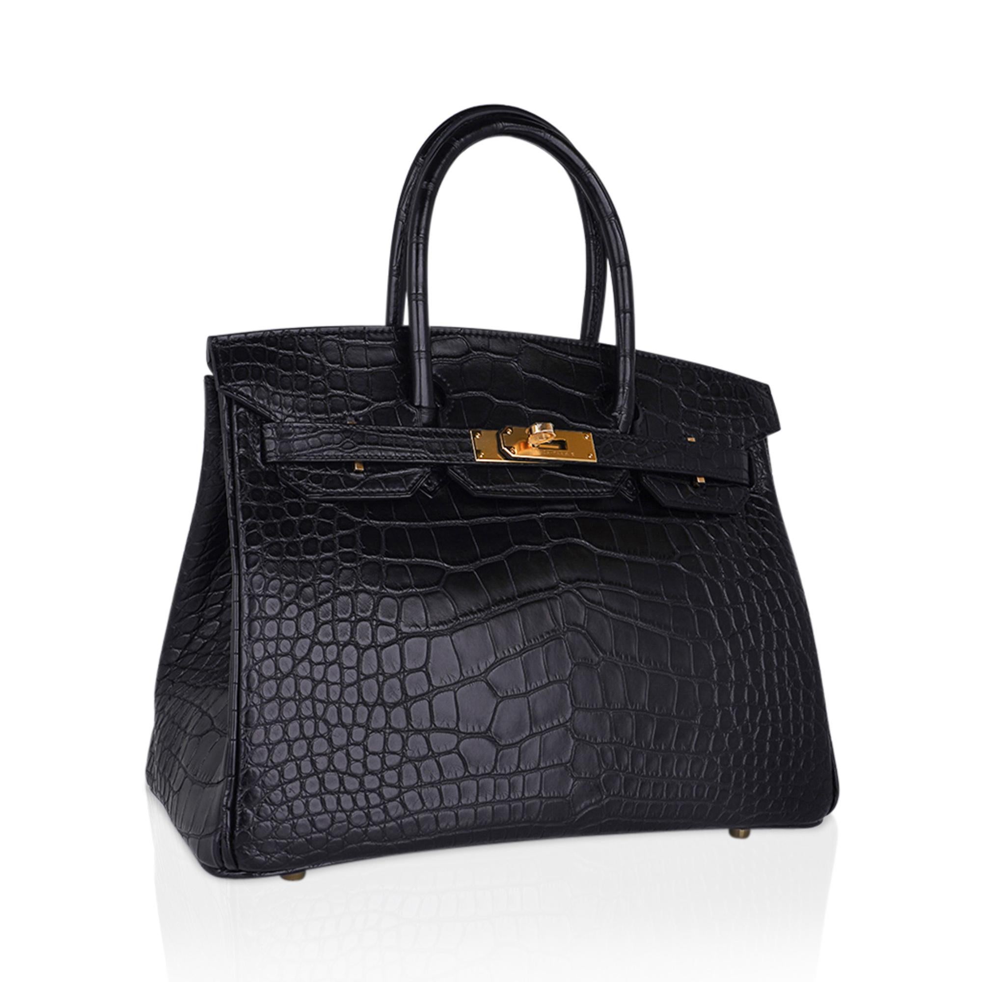 Mightychic offers a rare Hermes Birkin 30 bag featured in Black matte alligator.
Lush with gold hardware.
Classic and timeless this beautiful Hermes bag takes you from to evening in one step.
Comes with the lock and keys in the clochette, signature