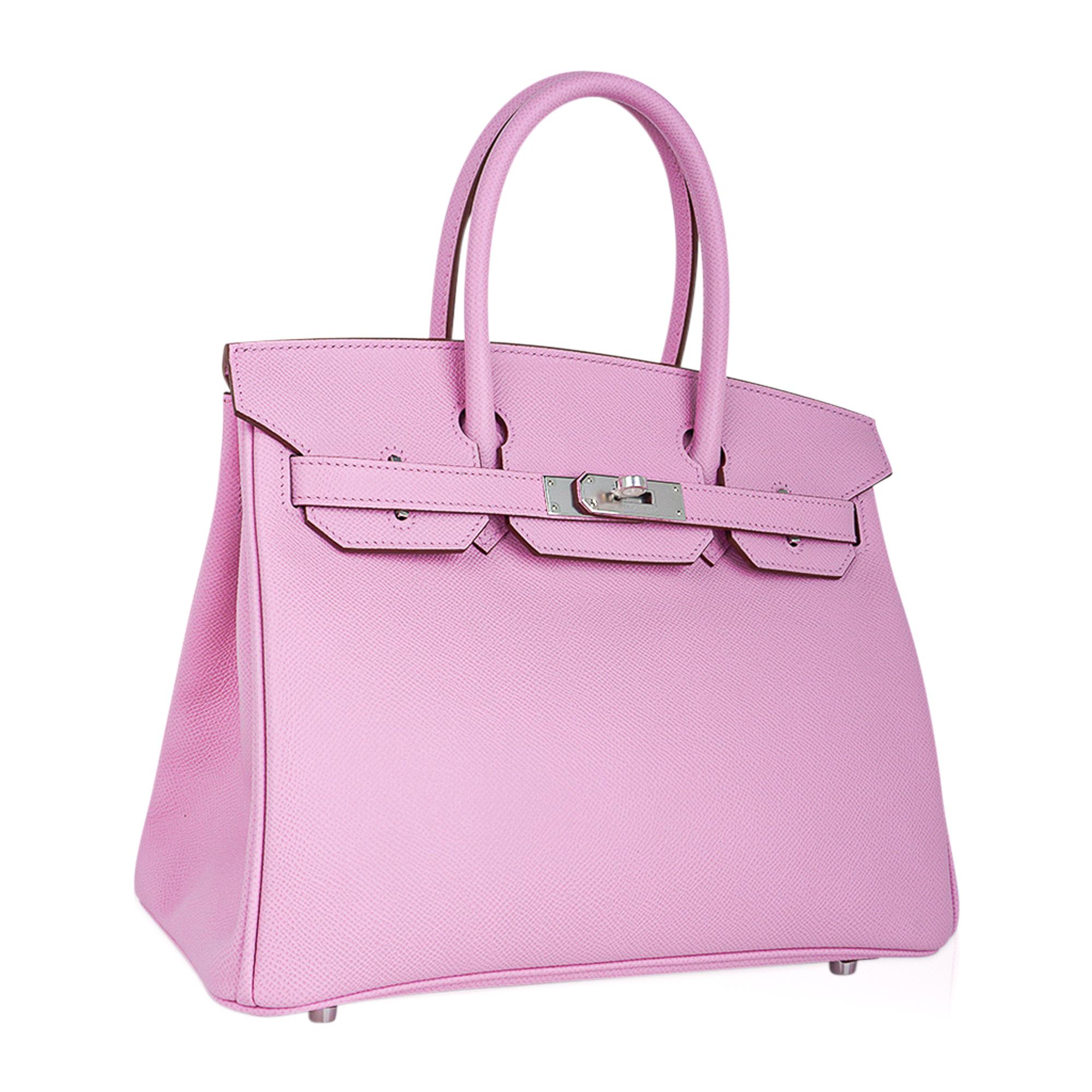 Mightychic offers an Hermes Birkin 30 bag featured in coveted Mauve Sylvestre.
This beautiful Birkin bag is complimented with palladium hardware.
Epsom leather which lends rich saturation of colour.
Comes with the lock and keys in the clochette,