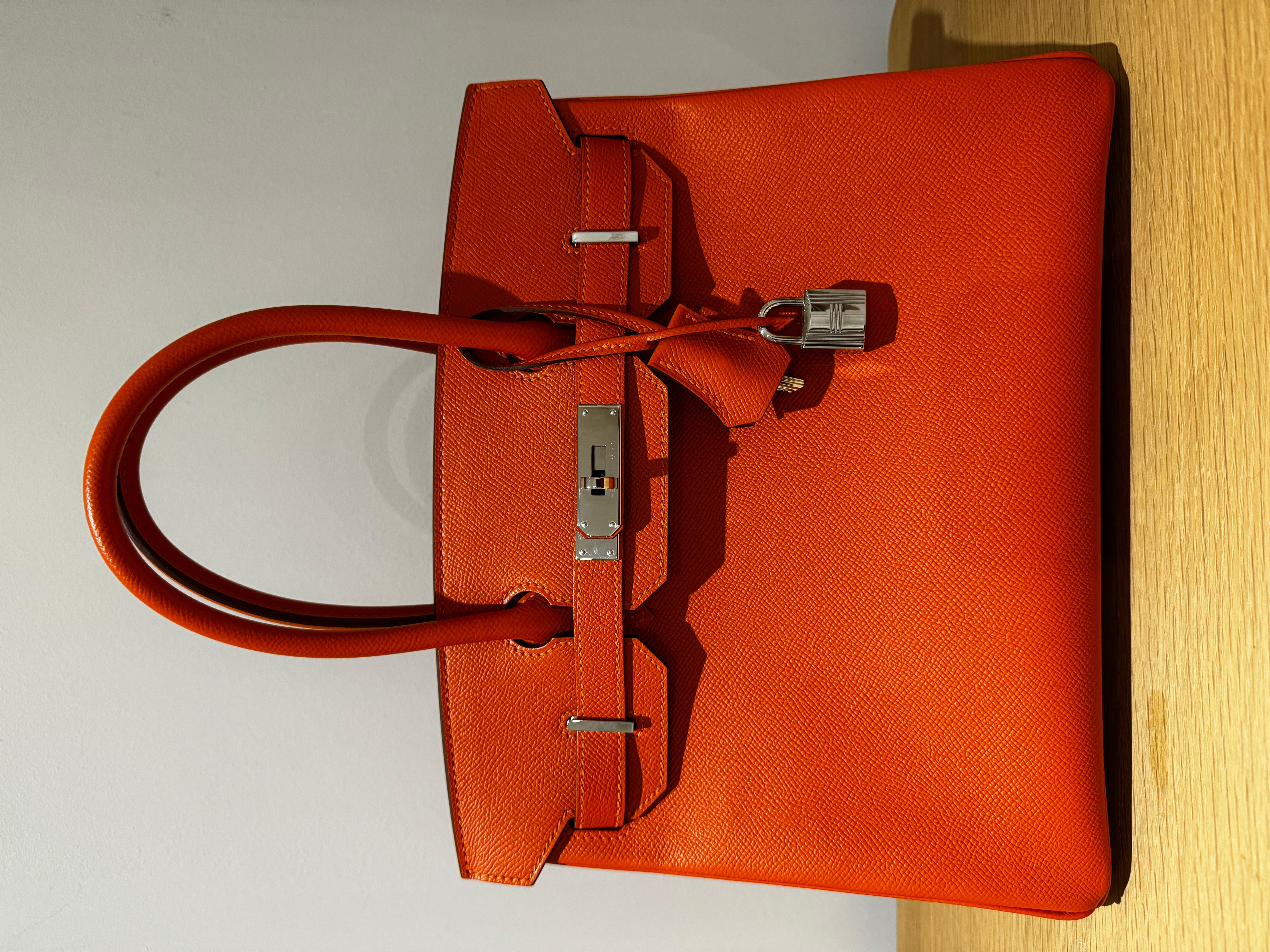 Hermes Birkin 30 Orange Epsom leather with gold hardware bag. The signature hermes colour orange. Comes with clochette, carebook, dustbag and box. 